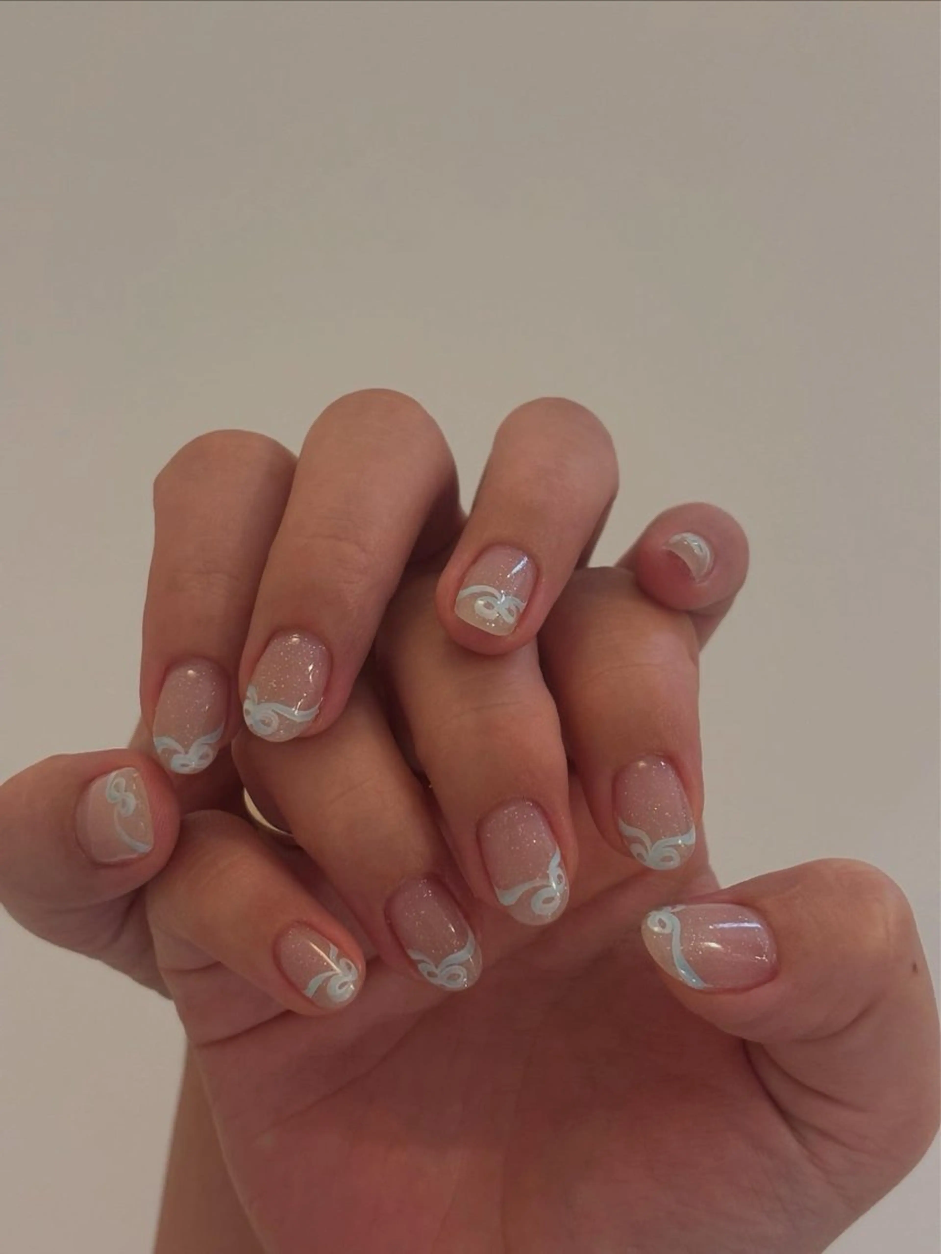 ネイル ブルー ラメ(グリッター) パステルネイル ピンク リボン ハンドネイル Elio所属・Elio 国泰寺のネイルデザイン