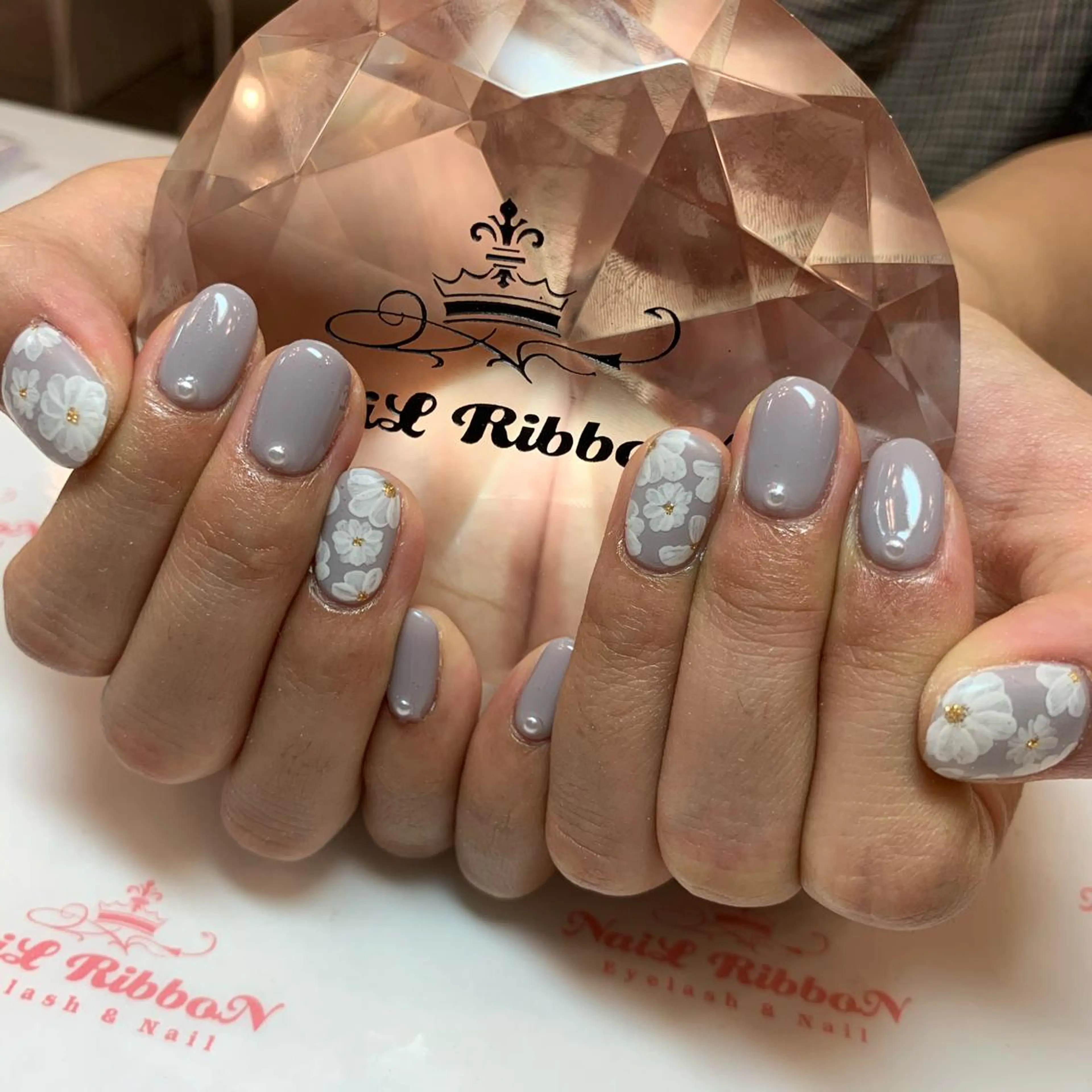 ネイル ネイルリボン 受付スタッフのネイルデザイン