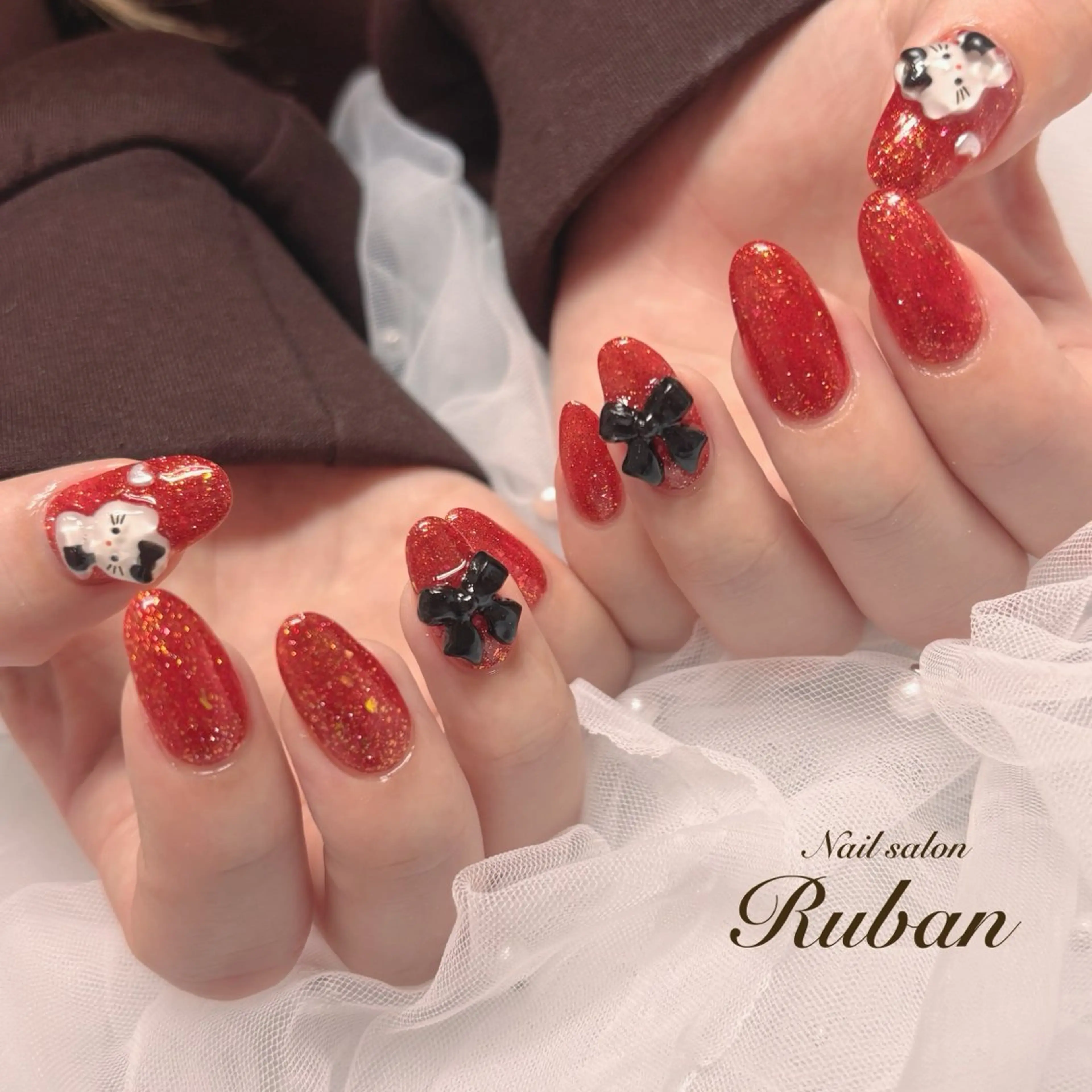 ネイル ハート 赤色 リボン Nail salon Ruban所属・Nail salon Rubanのネイルデザイン