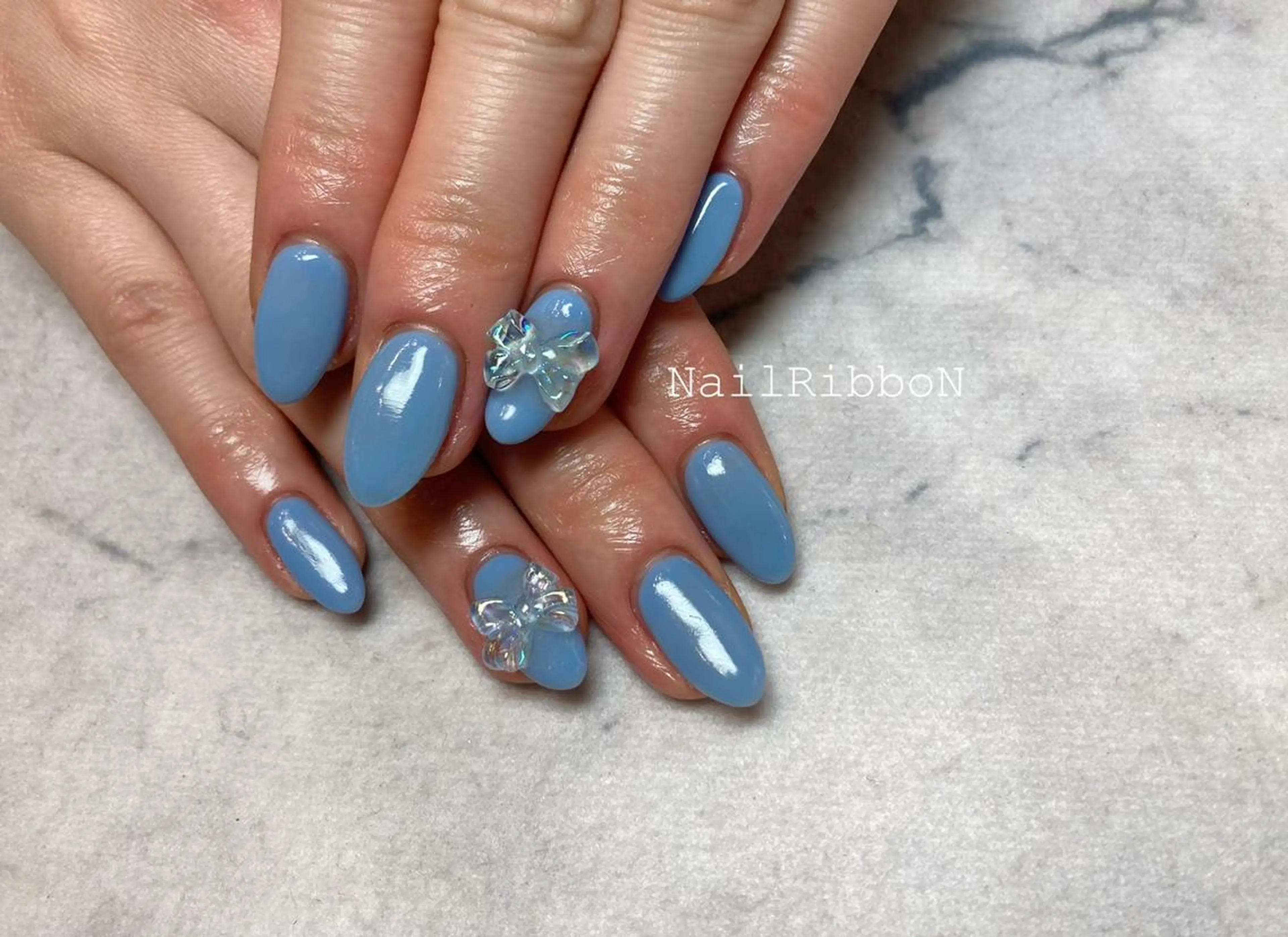 ネイル ネイルリボン 受付スタッフのネイルデザイン