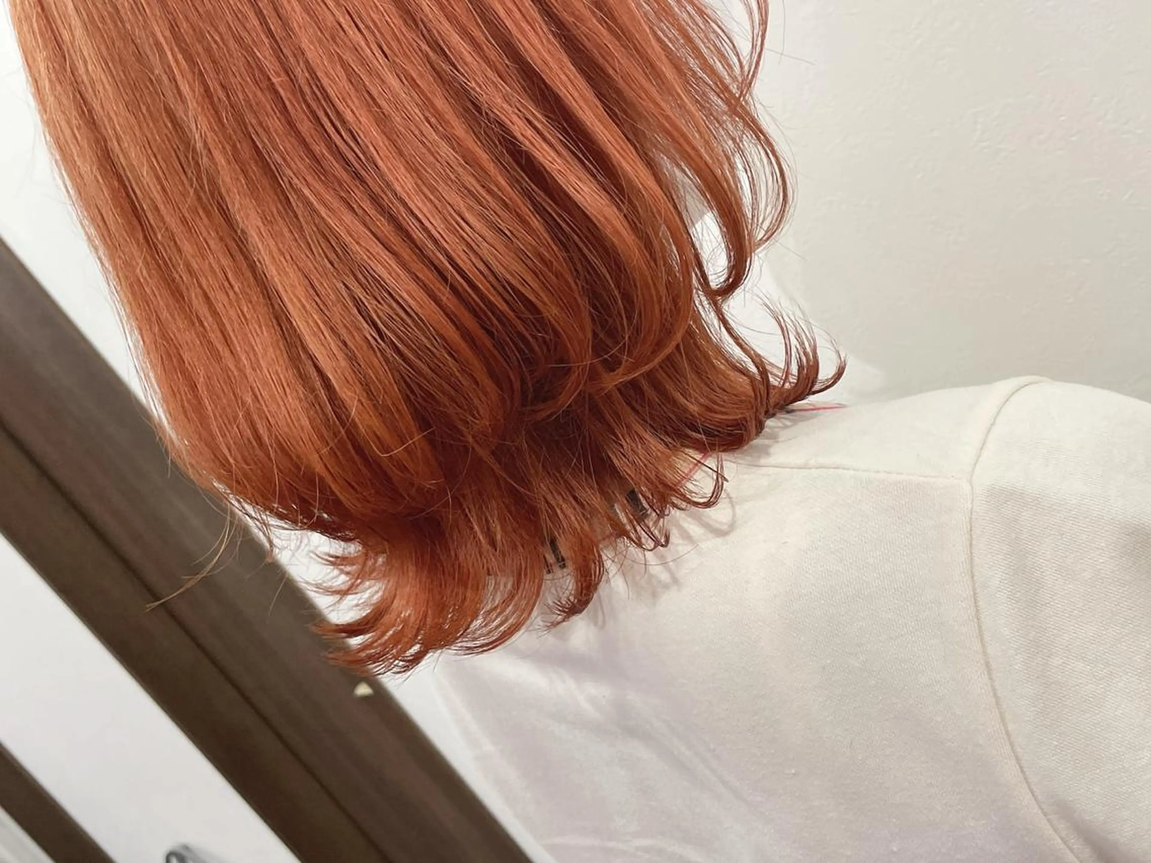 ミディアム カラー オレンジ TIARA minoriのヘアスタイル