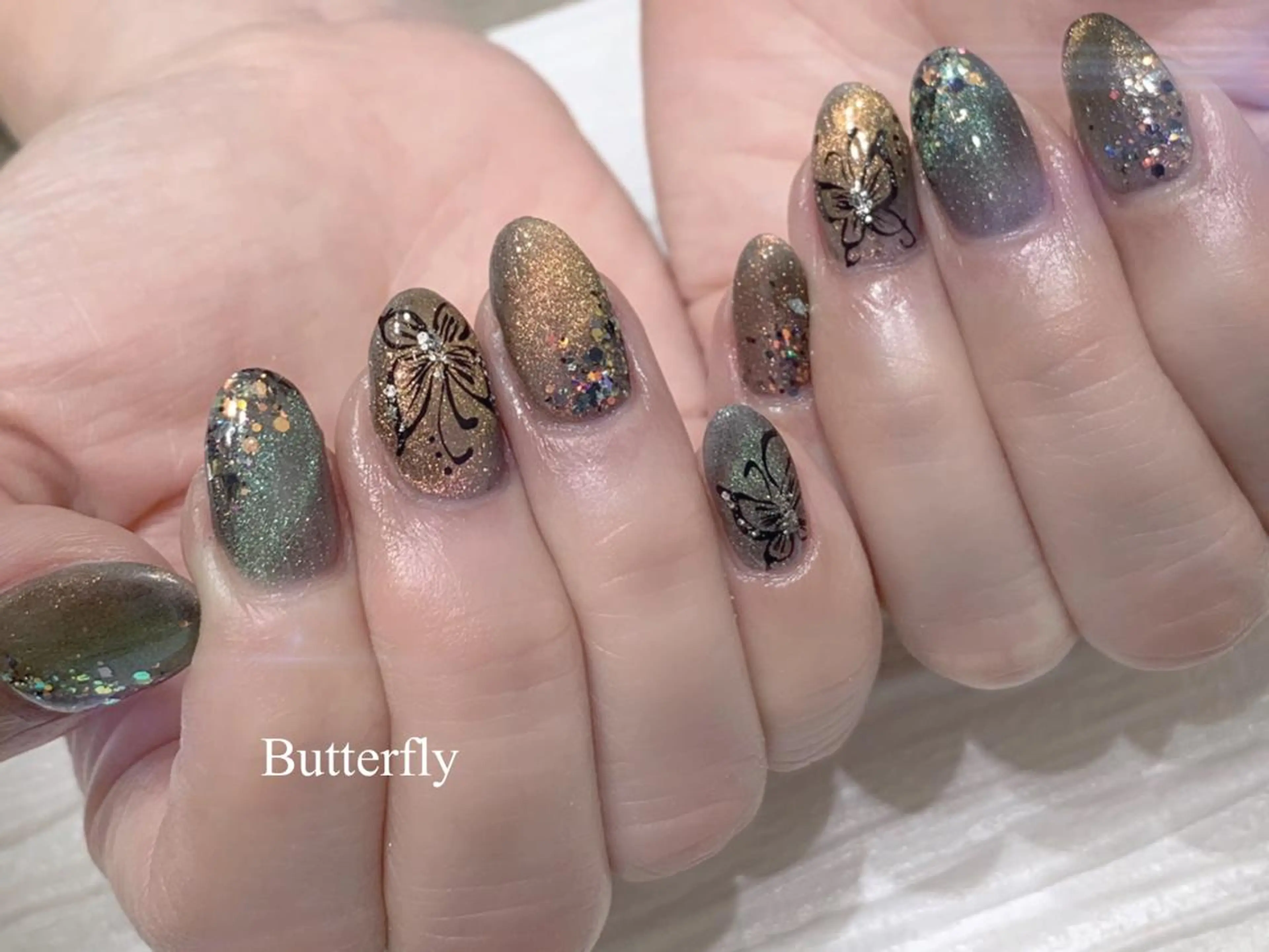 ミディアム m kaori𓃟のネイルデザイン