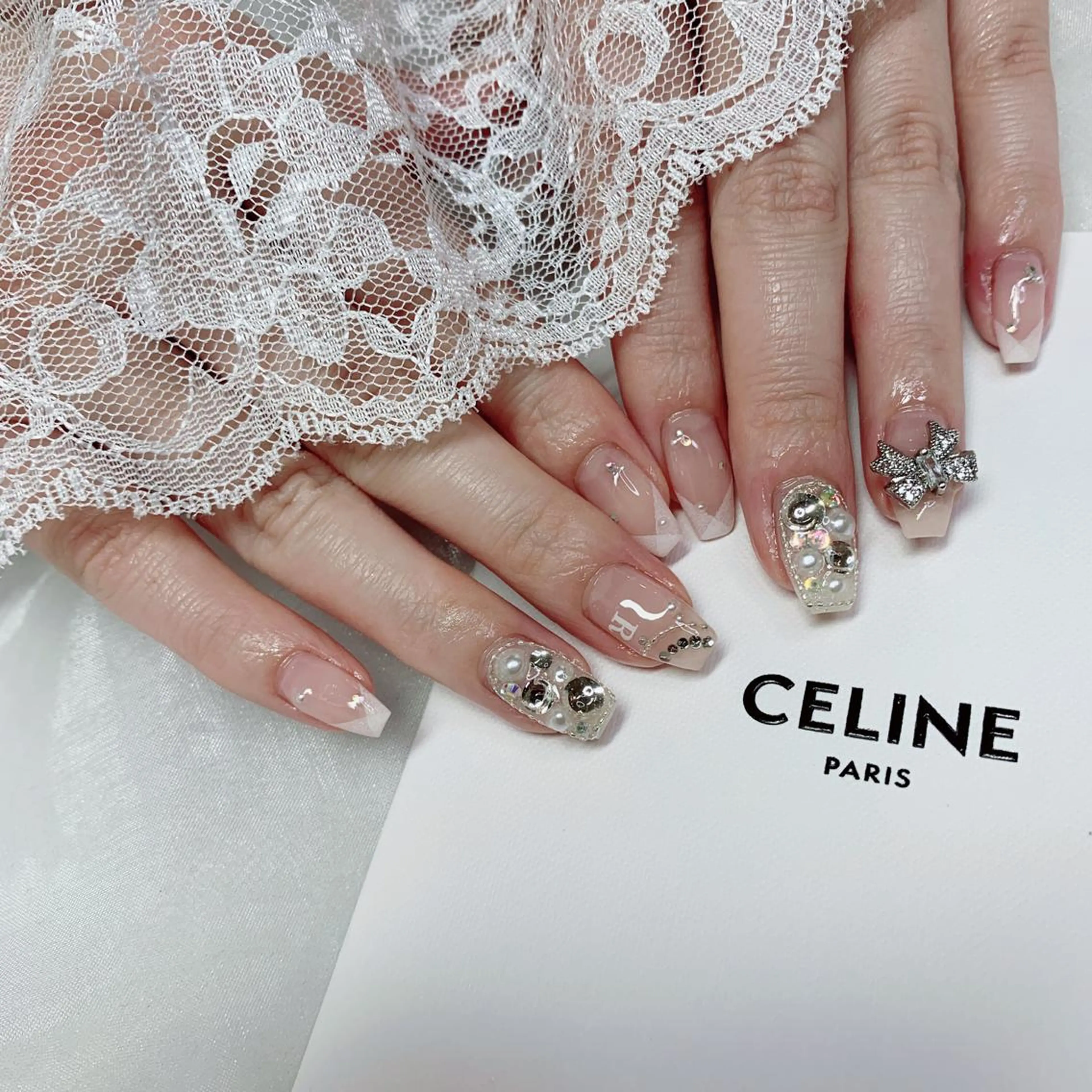 ネイル リボン ハンドネイル La neige* yuki 🥯🍑のネイルデザイン