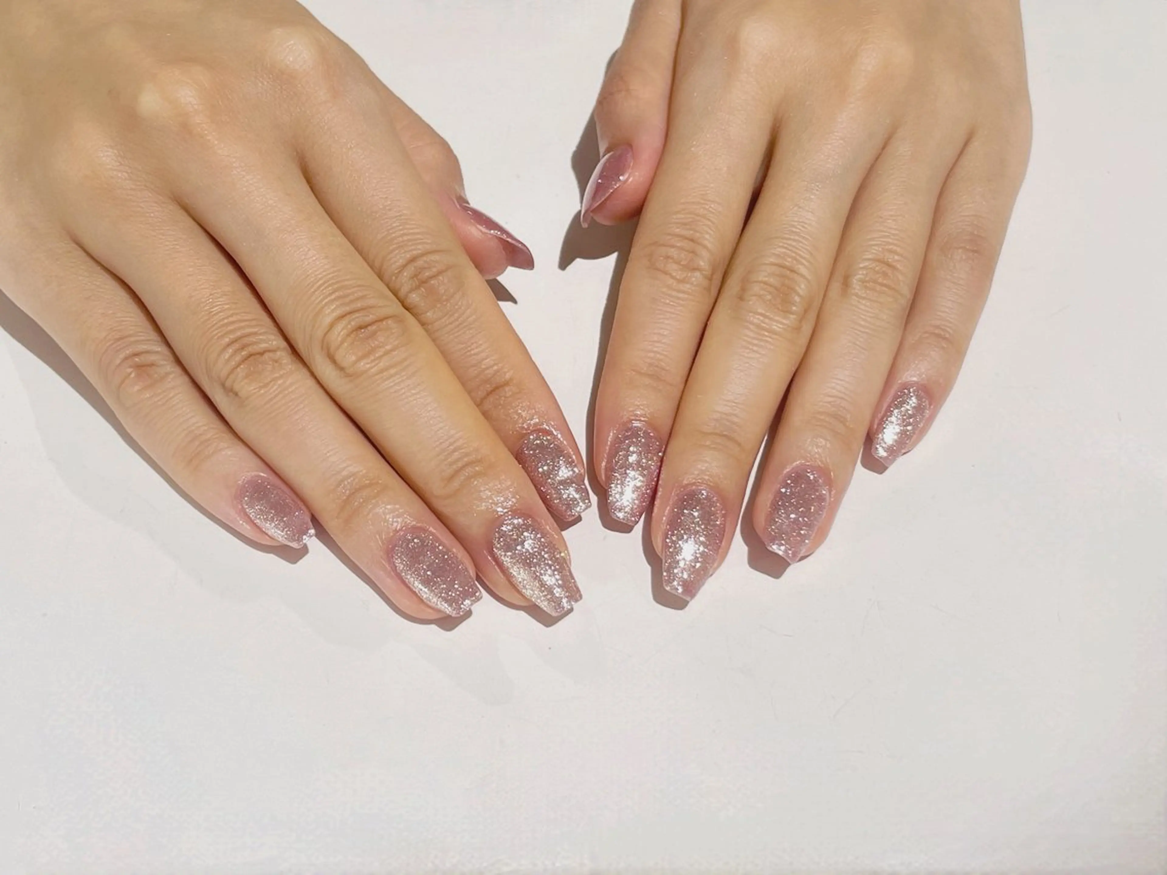 ネイル ラメ(グリッター) ワンカラーネイル ピンク 小林みお @ibelu京橋店のネイルデザイン