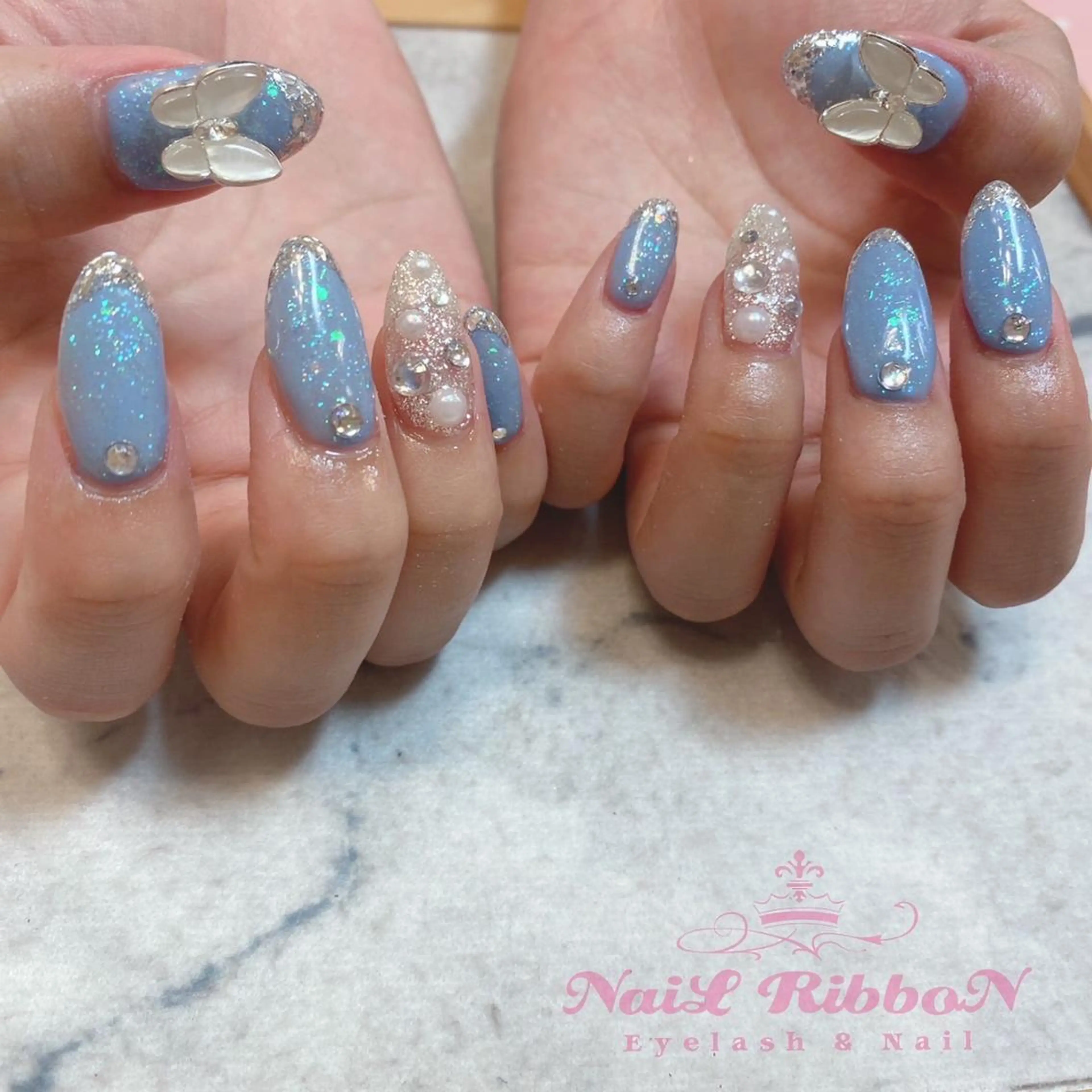 ネイル ネイルリボン 受付スタッフのネイルデザイン