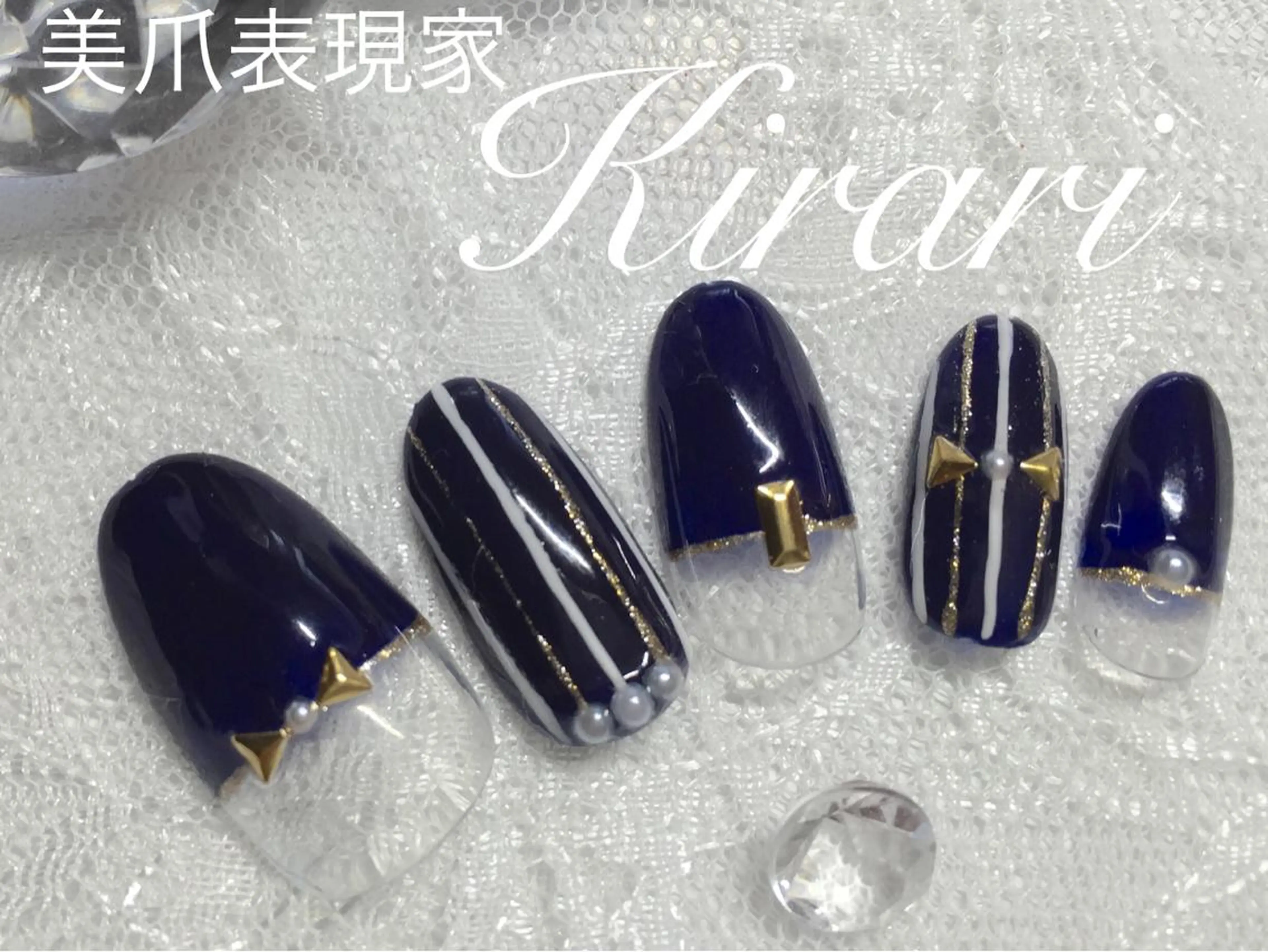 ネイル ネイビー リボン Nail &Beauty Salon ☆Kirari☆所属・ビューティサロン ☆Kirari☆のネイルデザイン