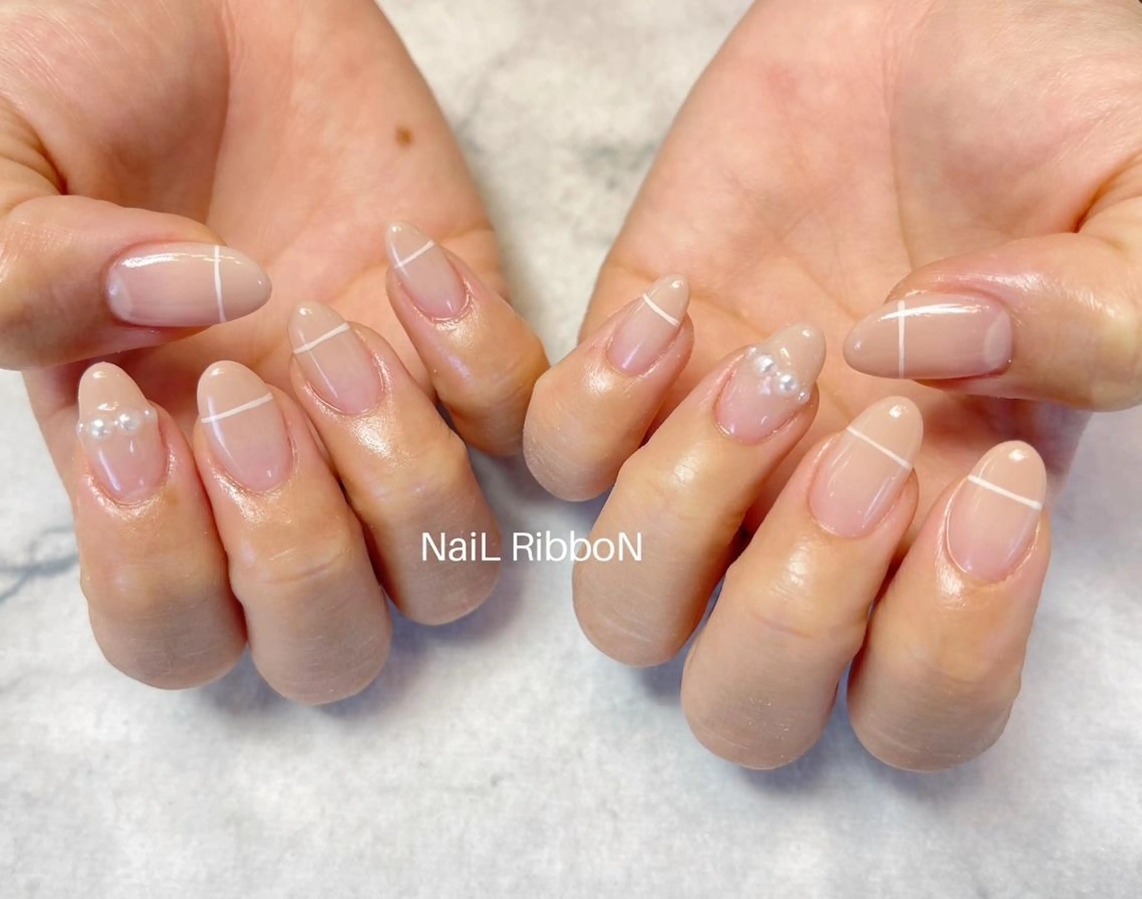 ネイル ネイルリボン 受付スタッフのネイルデザイン