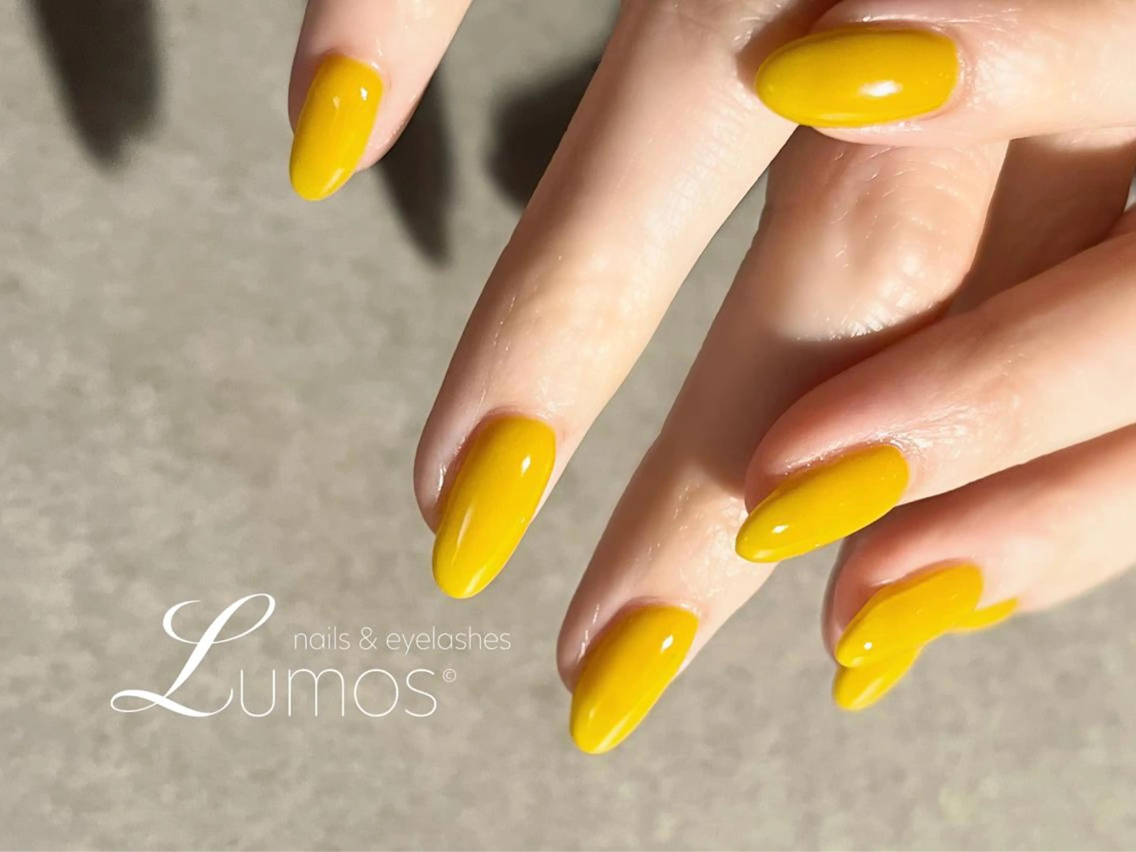 ネイル 桜ネイル ワンカラーネイル 黄色 ハンドネイル Lumos/nail &eyelashes桜川店所属・Lumos Annのネイルデザイン