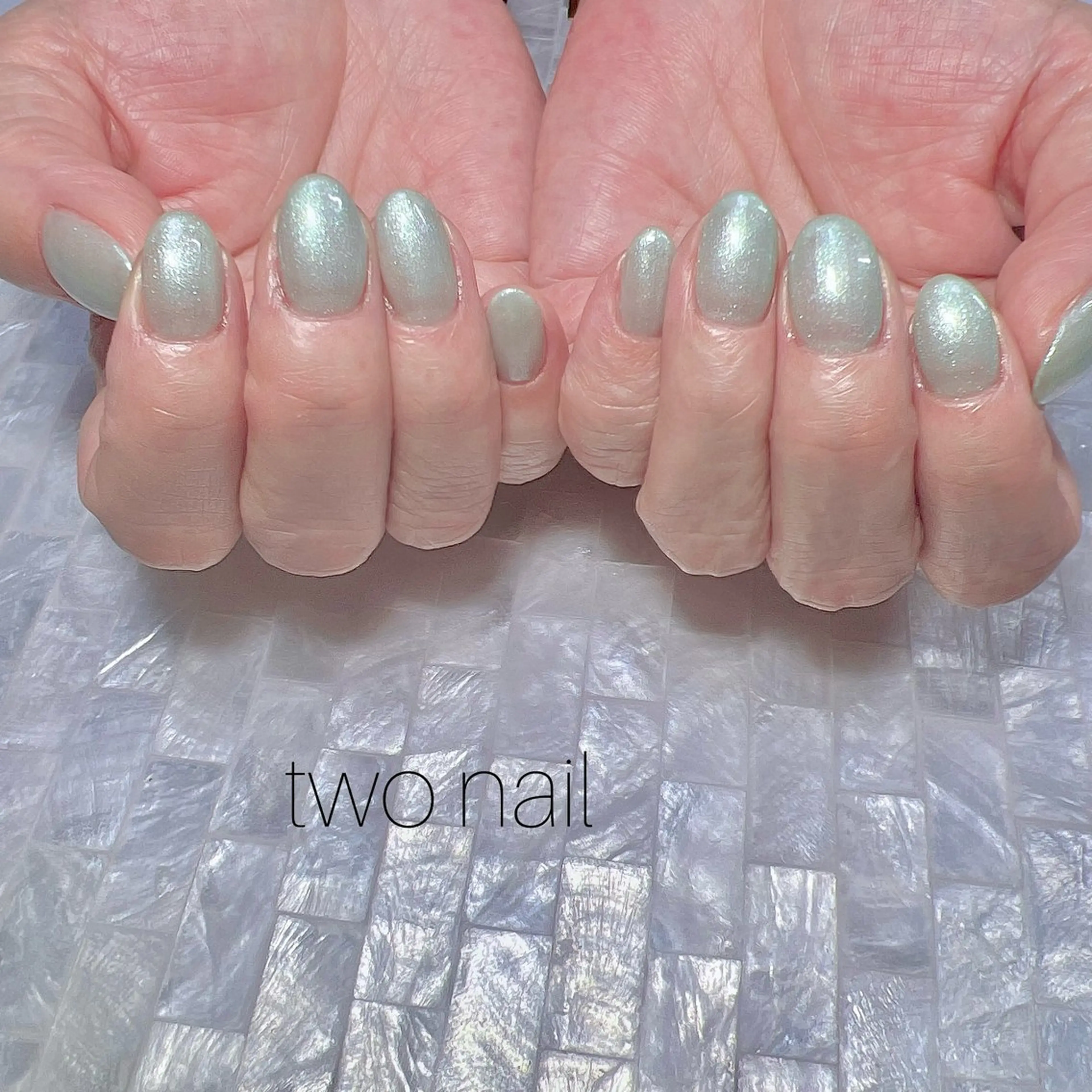 ネイル キラキラネイル ネイルチップ ホワイト ハンドネイル two nailのネイルデザイン