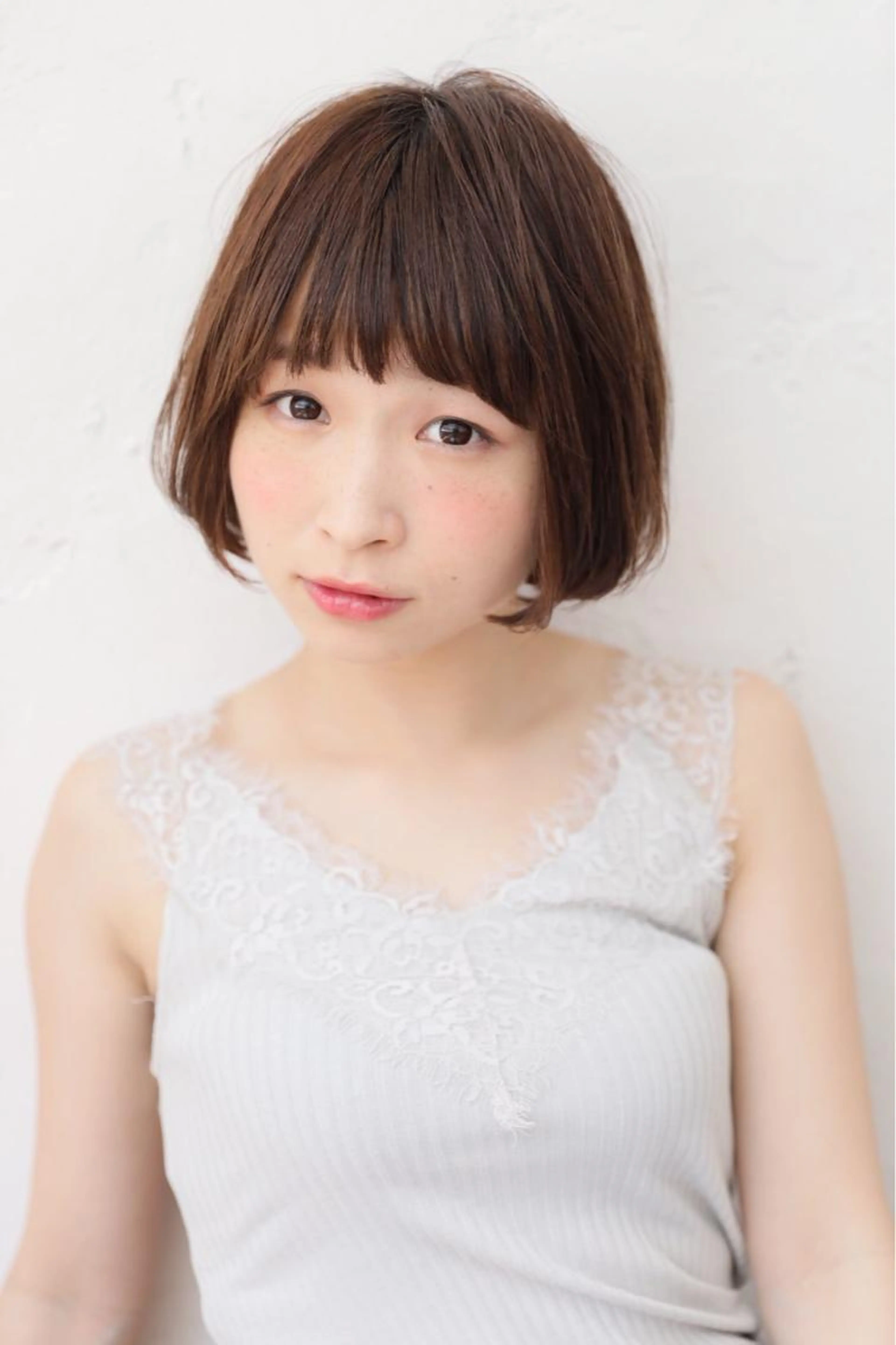 ポイントストレート耳前から前髪の部分ストレートの写真