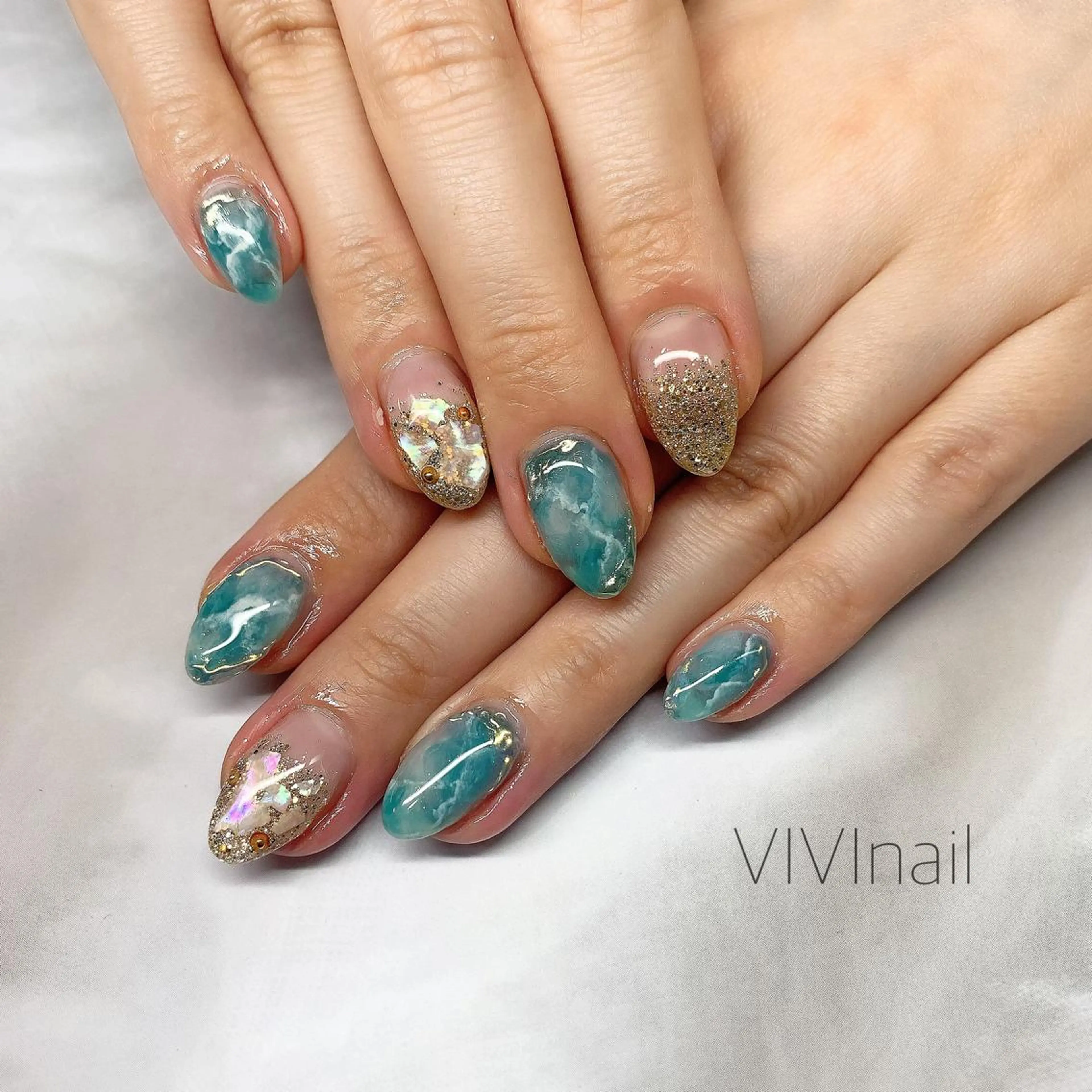 ネイル ブルー キラキラネイル 大理石ネイル(マーブル) ハンドネイル vivi nailのネイルデザイン