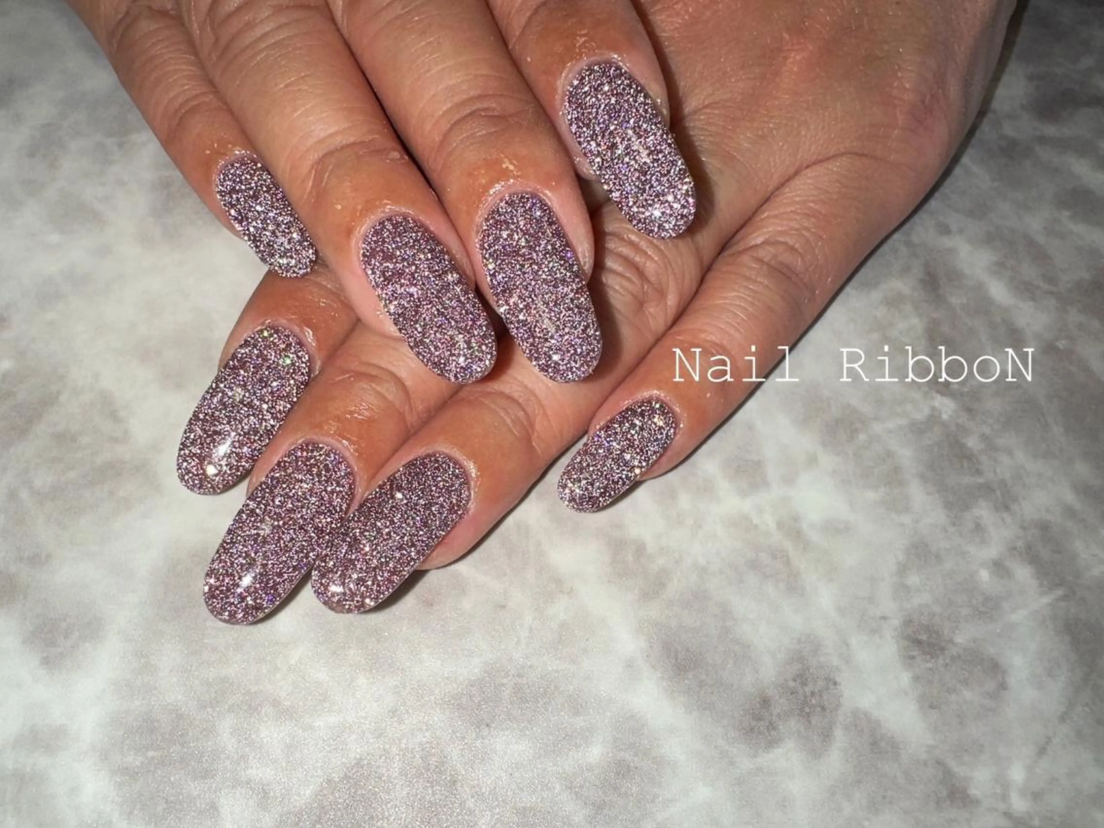 ネイル ネイルリボン 受付スタッフのネイルデザイン