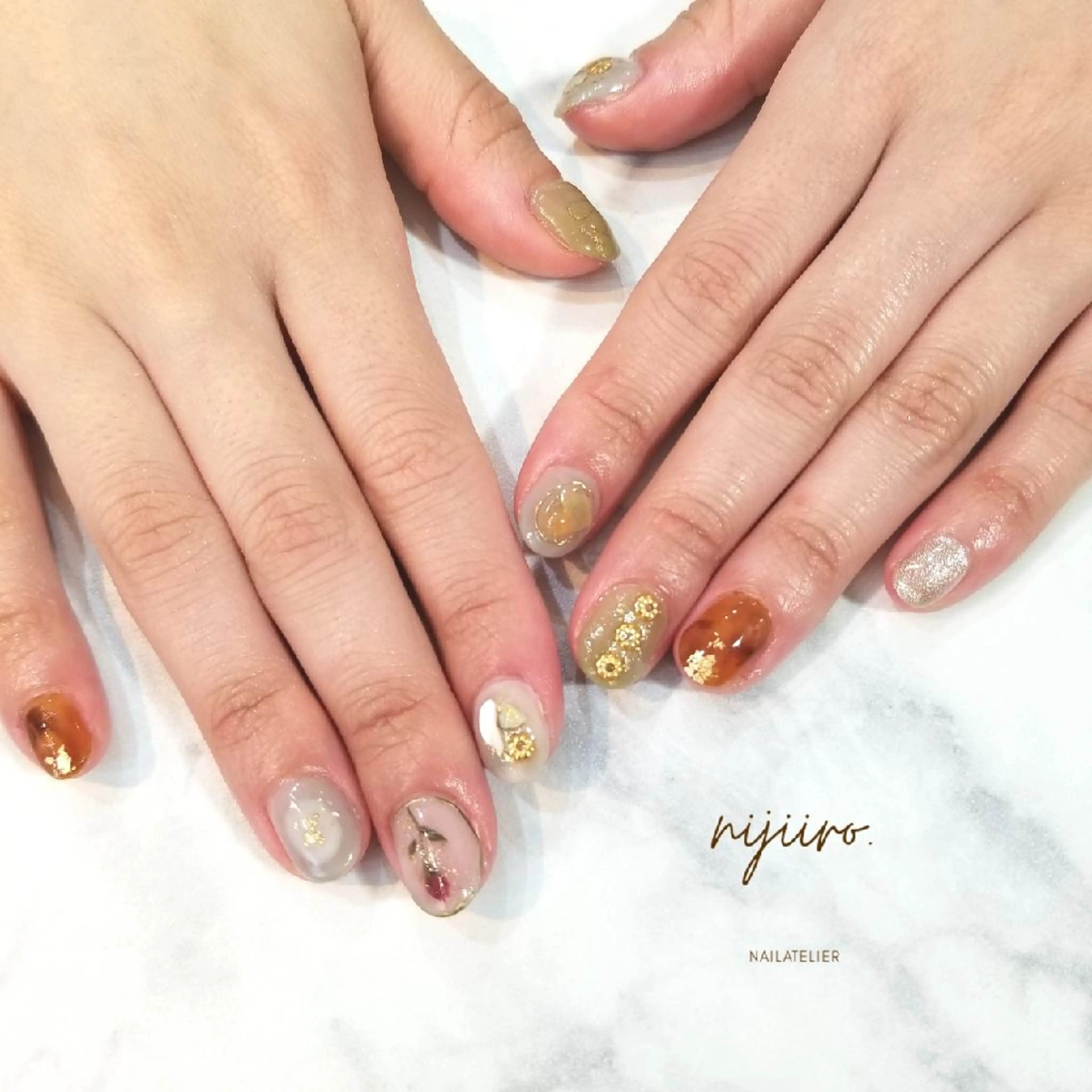 ネイル べっ甲ネイル ハンドネイル nailatelier nijiiro.所属・nijiiro🌈 サトウのネイルデザイン