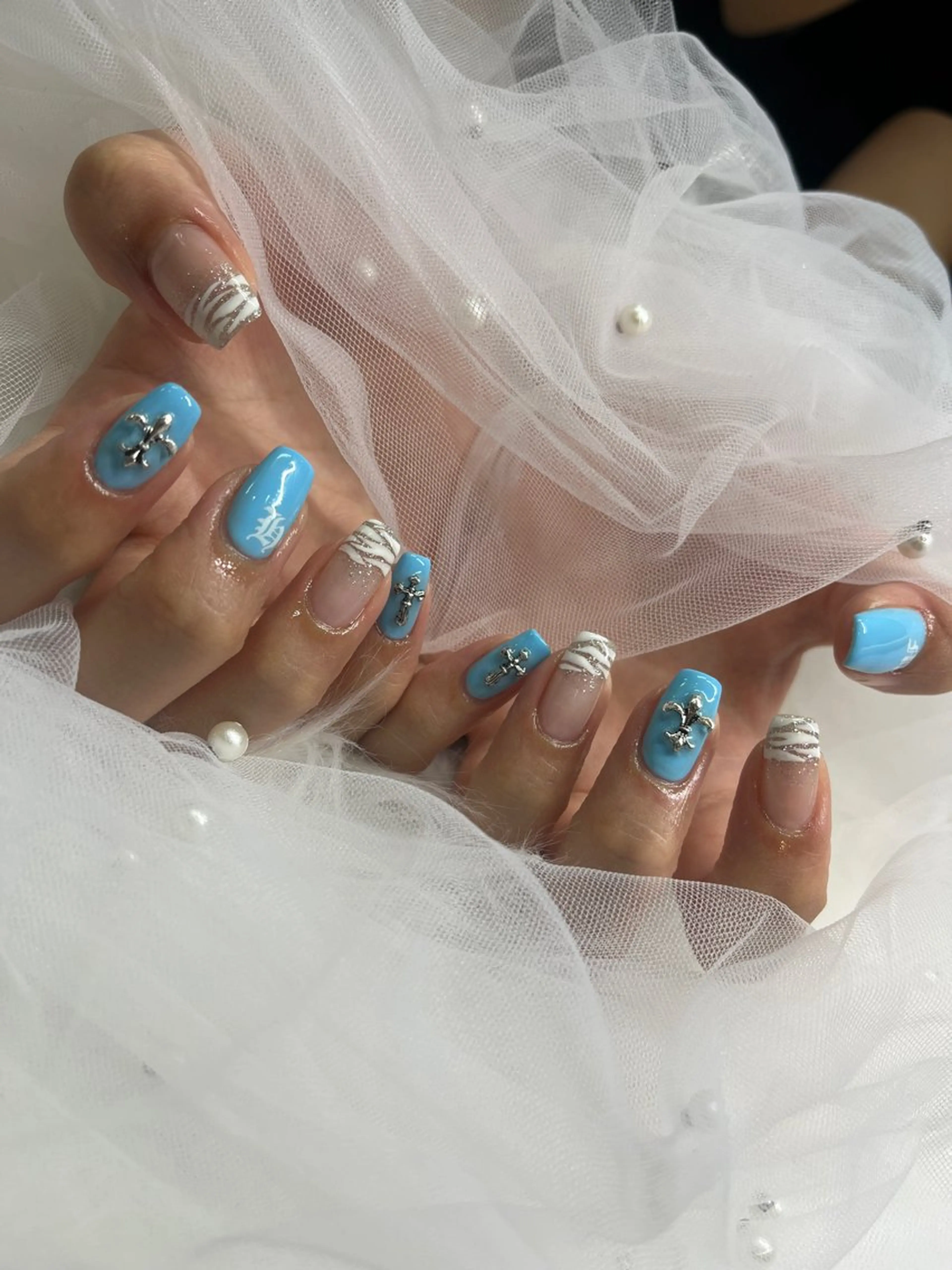 ネイル アニマル柄 水色 ハンドネイル Partie所属・Partie （パルティ）のネイルデザイン