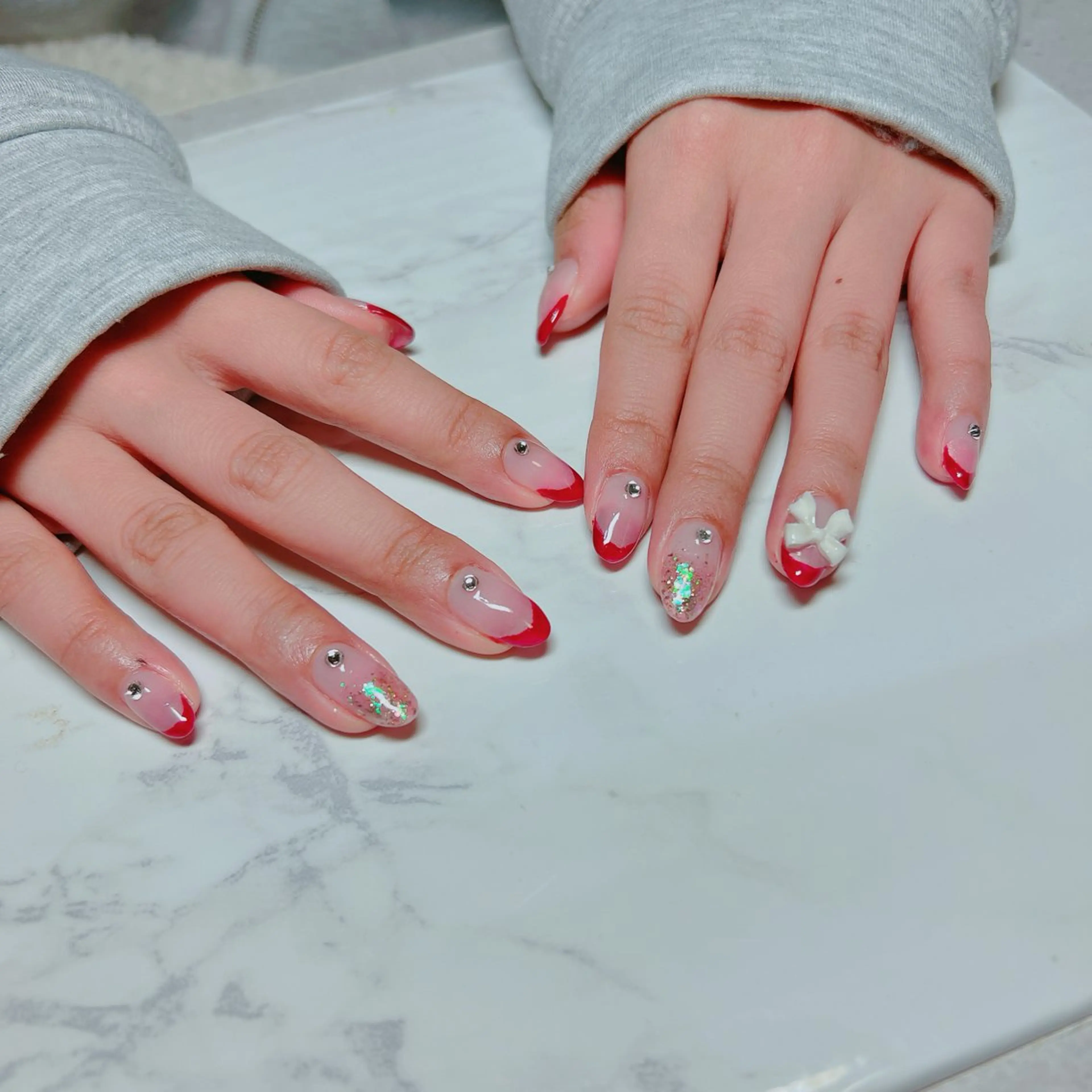 ネイル フレンチネイル 赤色 リボン ハンドネイル たきぐち みちこのネイルデザイン