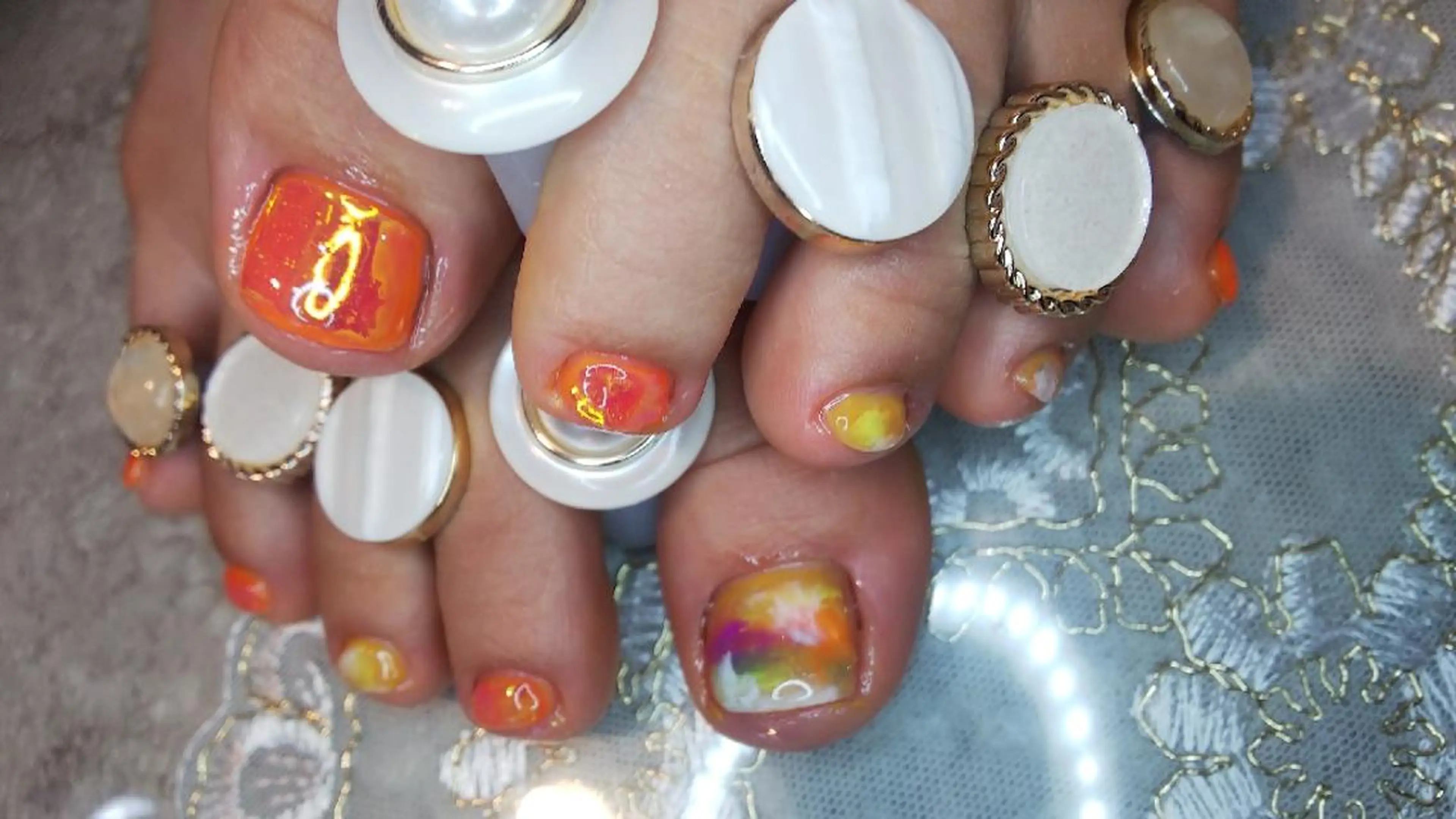 ネイル フットネイル 氷ネイル・うるうるネイル オレンジ フットネイル jurinailtokyo所属・jurinail tokyoのネイルデザイン