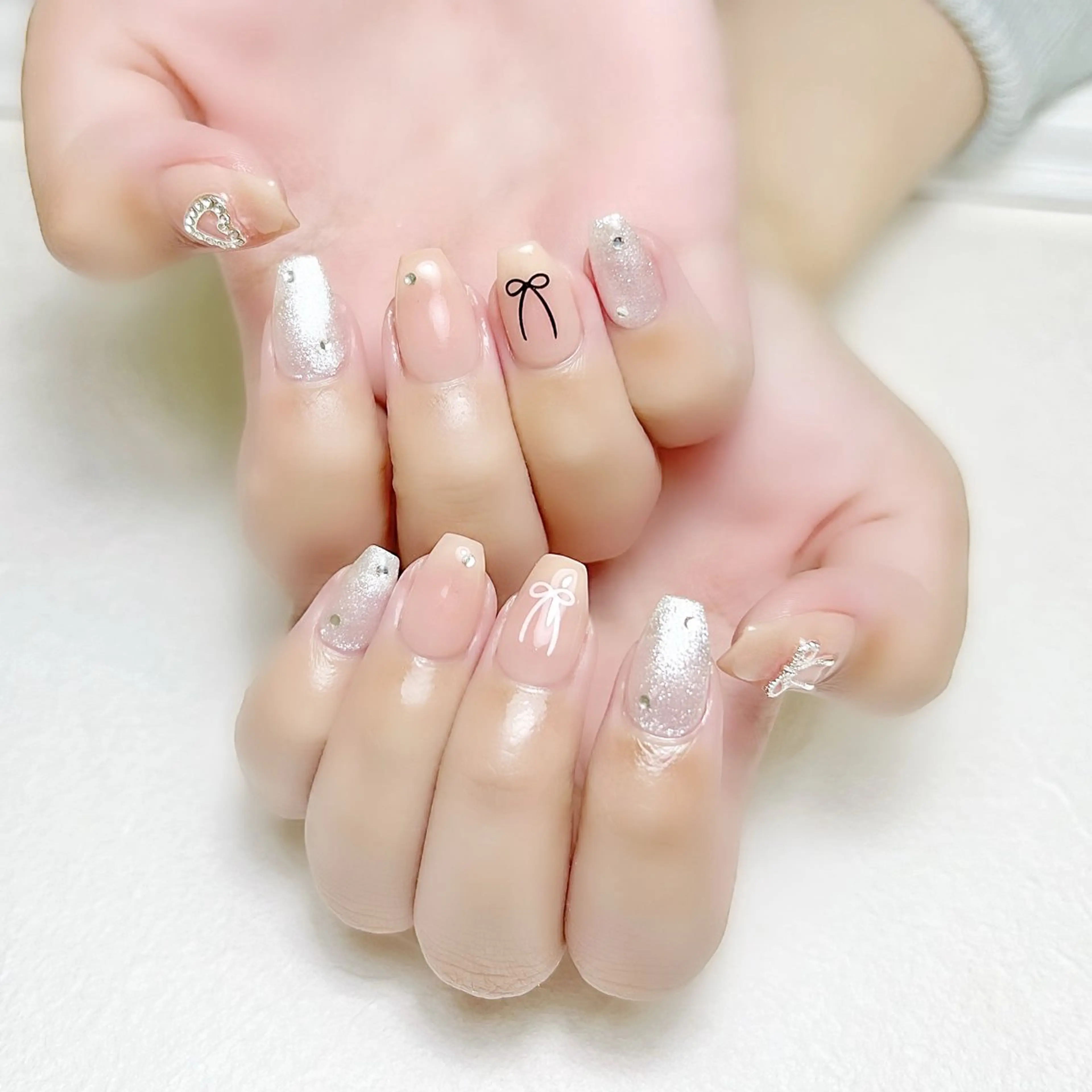 ネイル チークネイル ラメ(グリッター) 持ち込み リボン 春ネイル rouse nail RISATOのネイルデザイン
