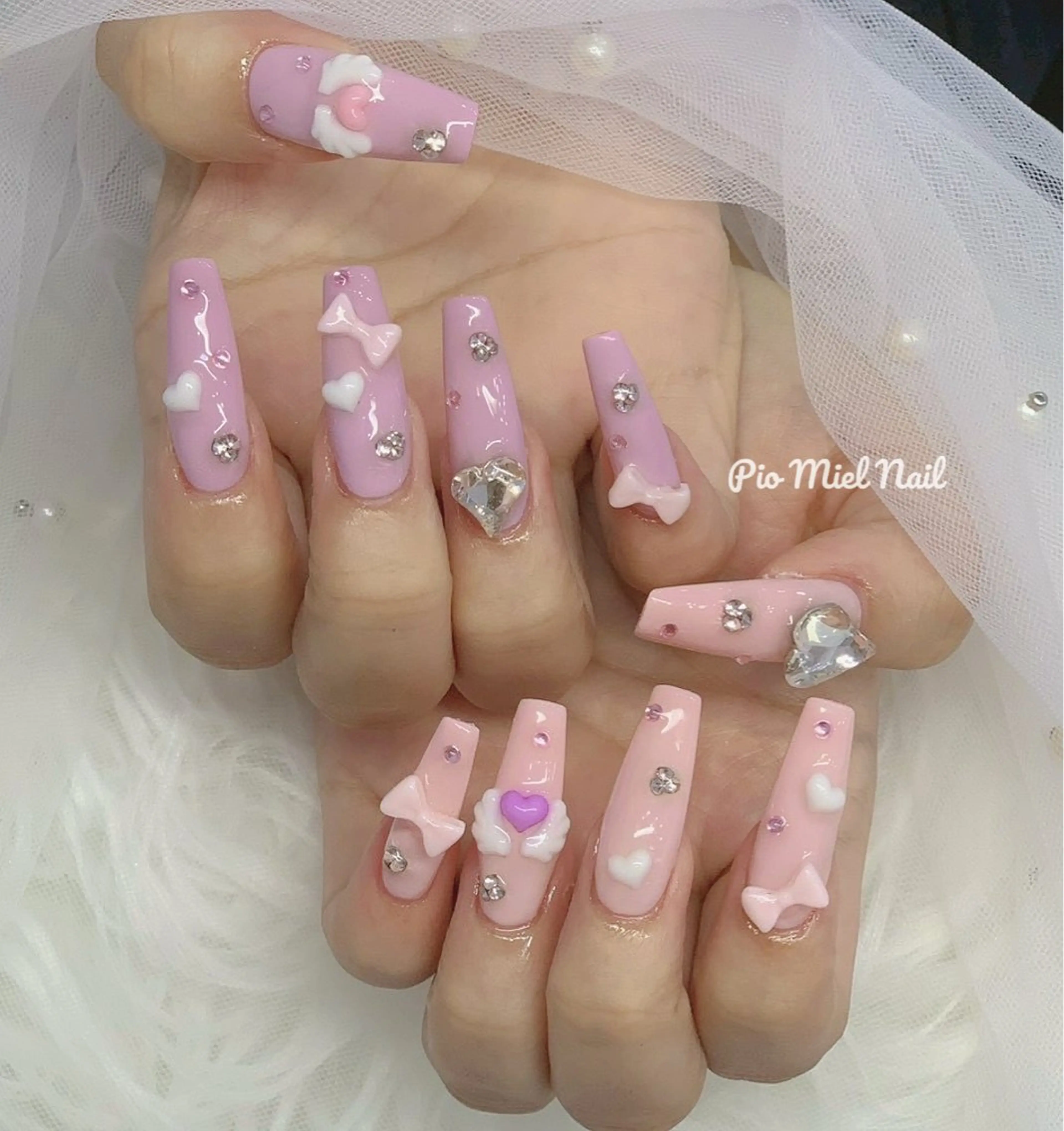 ロング ハンドネイル Pio Mielのネイルデザイン