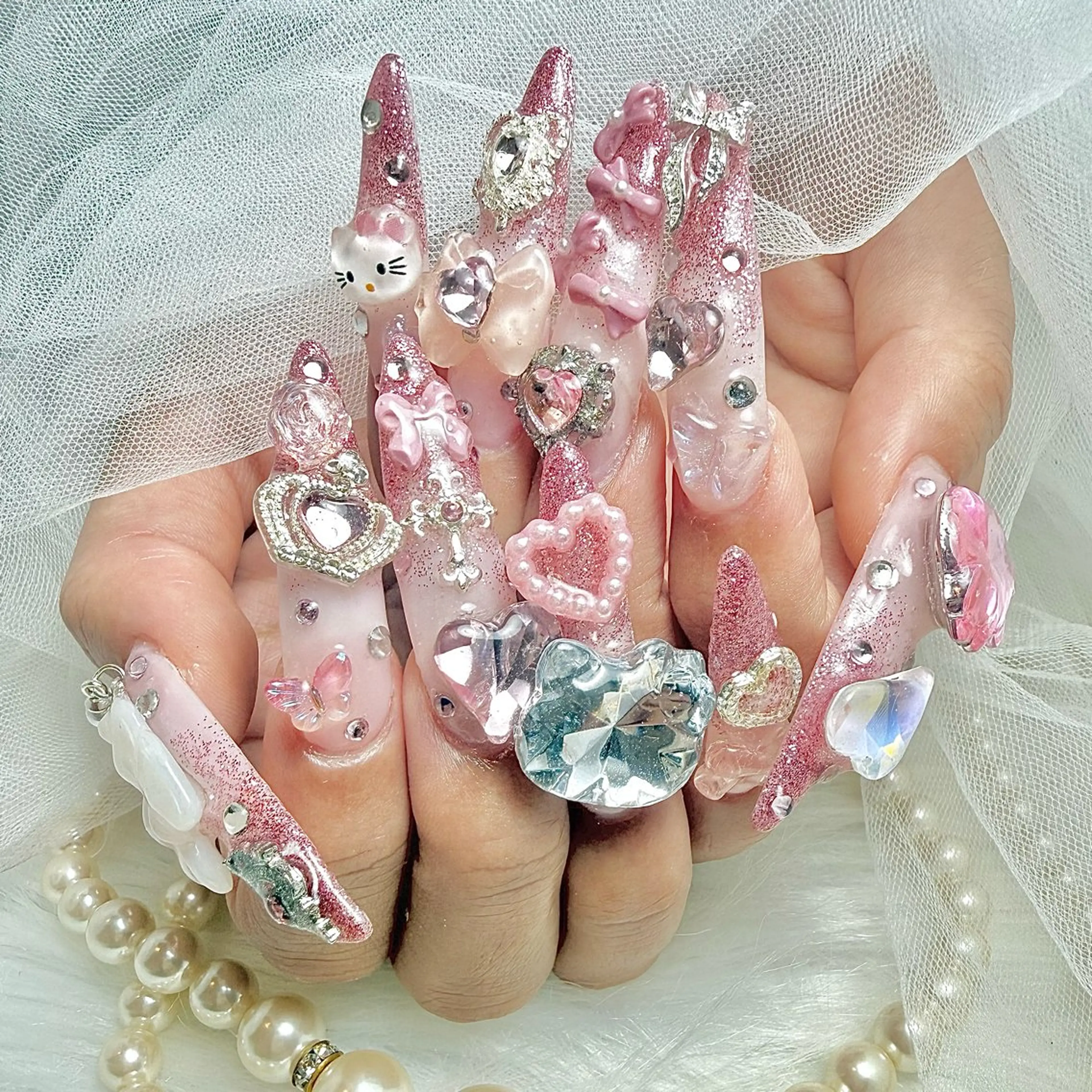 ロング ハンドネイル Conjunim MAMI🎀✨のネイルデザイン