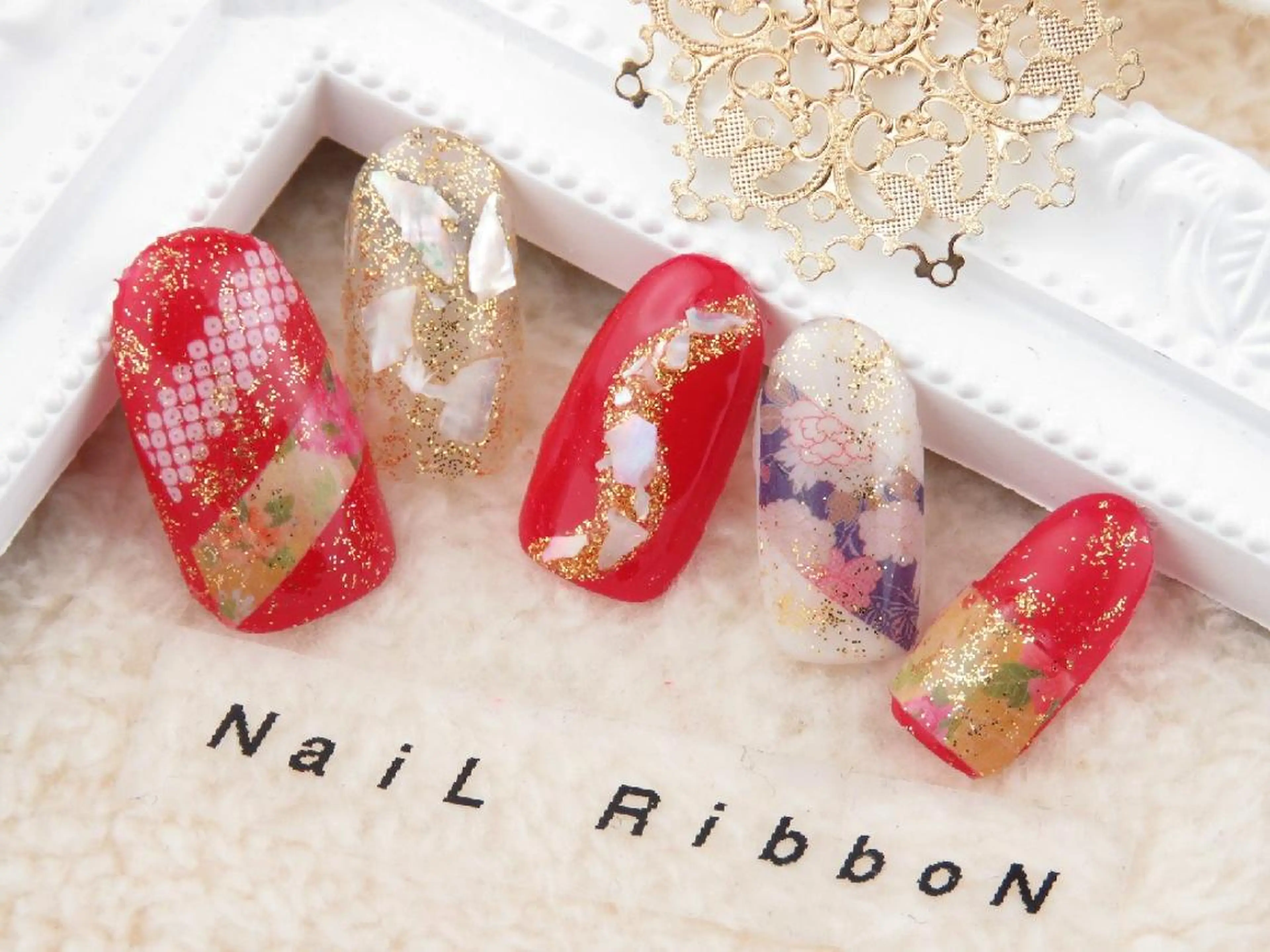 ネイル 成人式 ネイルリボン 受付スタッフのネイルデザイン