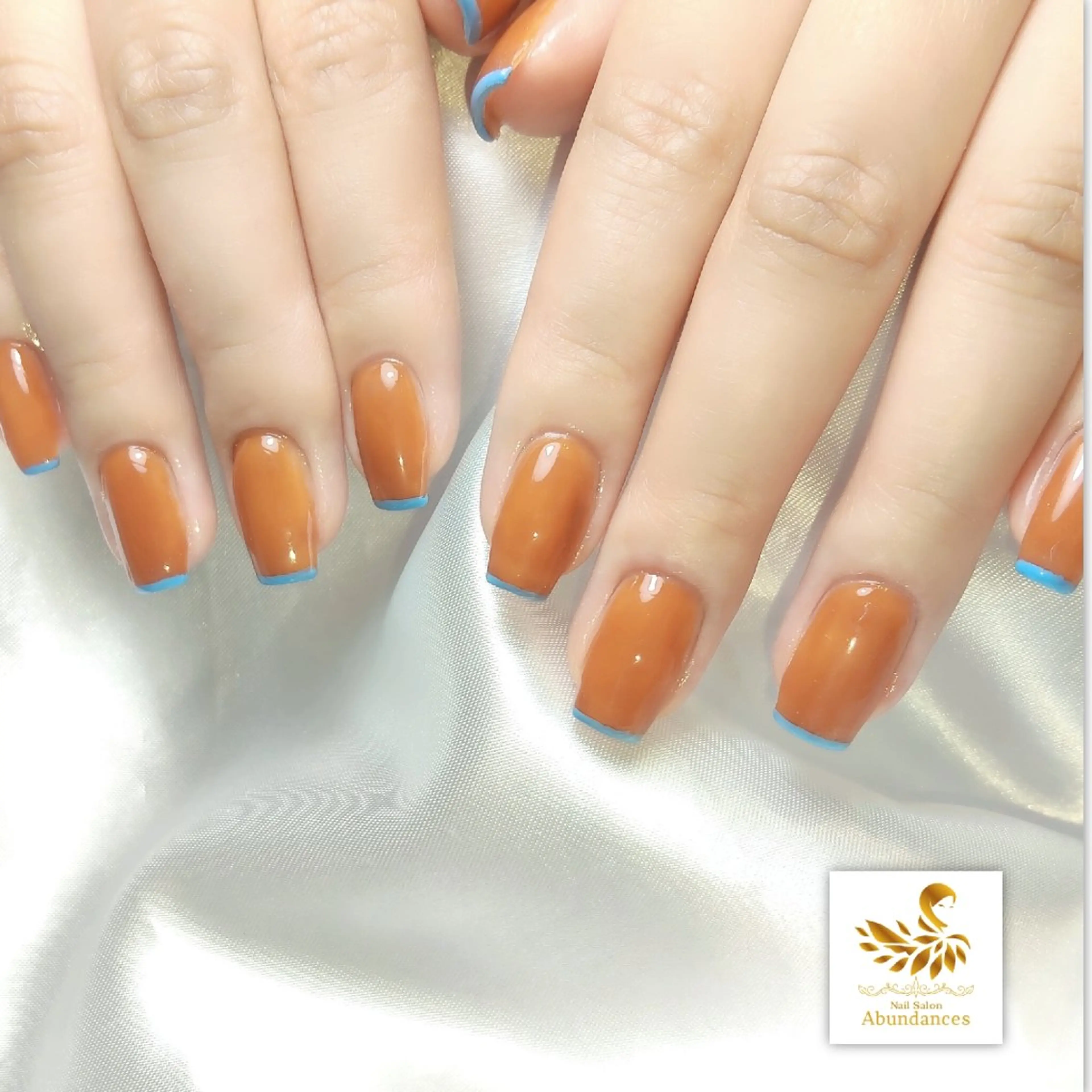 ネイル ブラウン フレンチネイル 水色 オレンジ スクエアネイル ハンドネイル 完全予約制個室サロン Abundancesのネイルデザイン