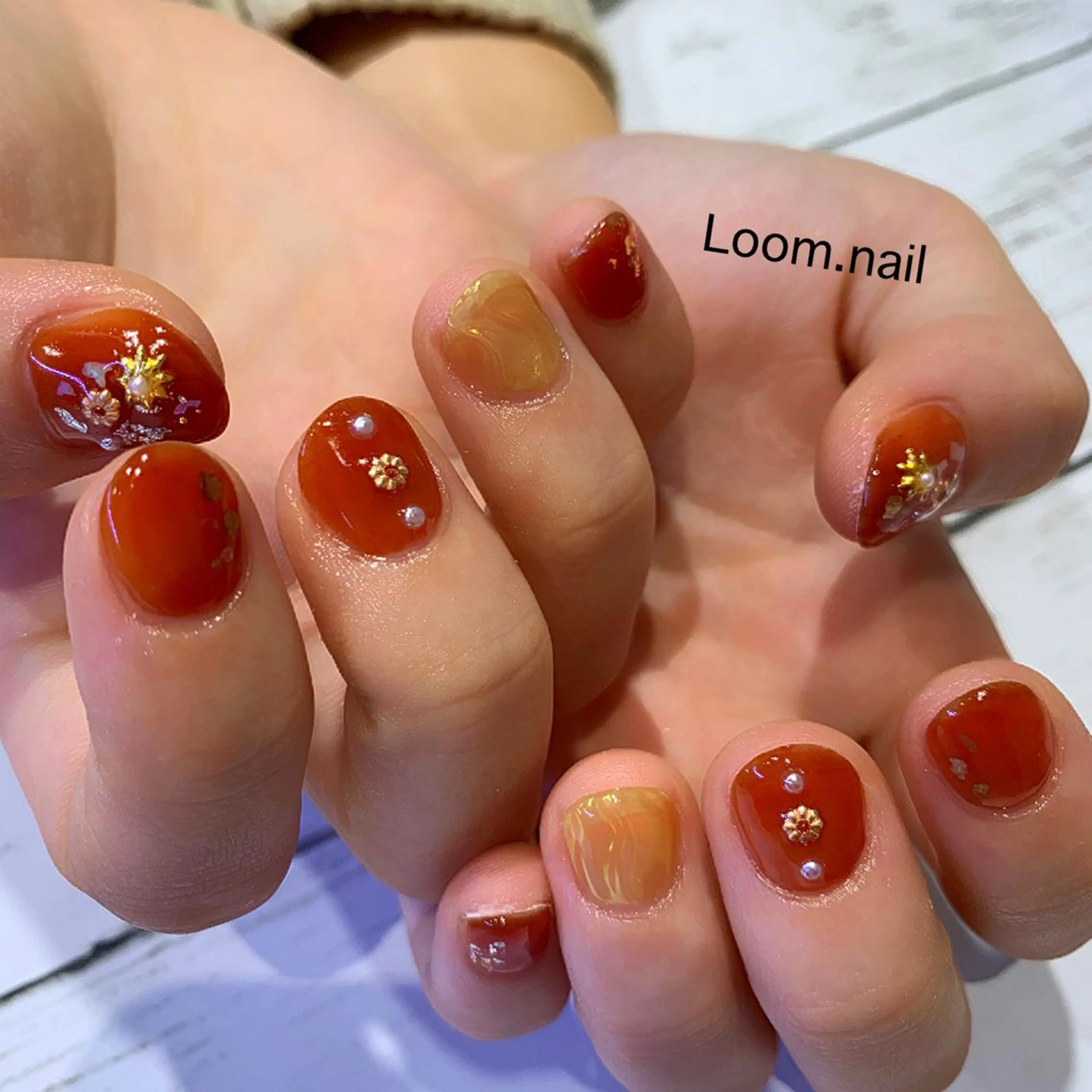 ネイル オレンジ ショートネイル Loom所属・hrd manamiのネイルデザイン