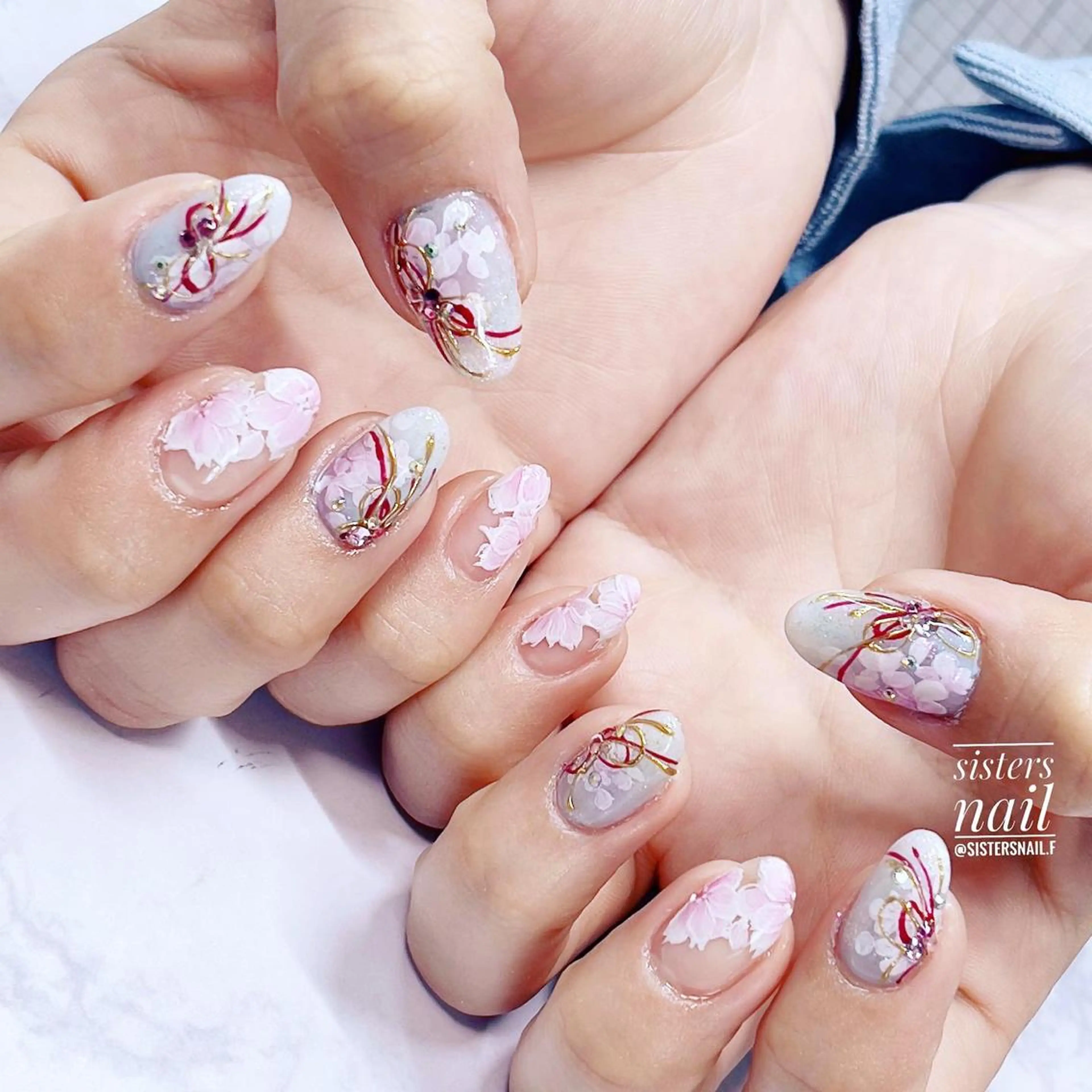 ネイル アートネイル ブルー 桜ネイル フラワーネイル ラメ(グリッター) sisters nail.fのネイルデザイン