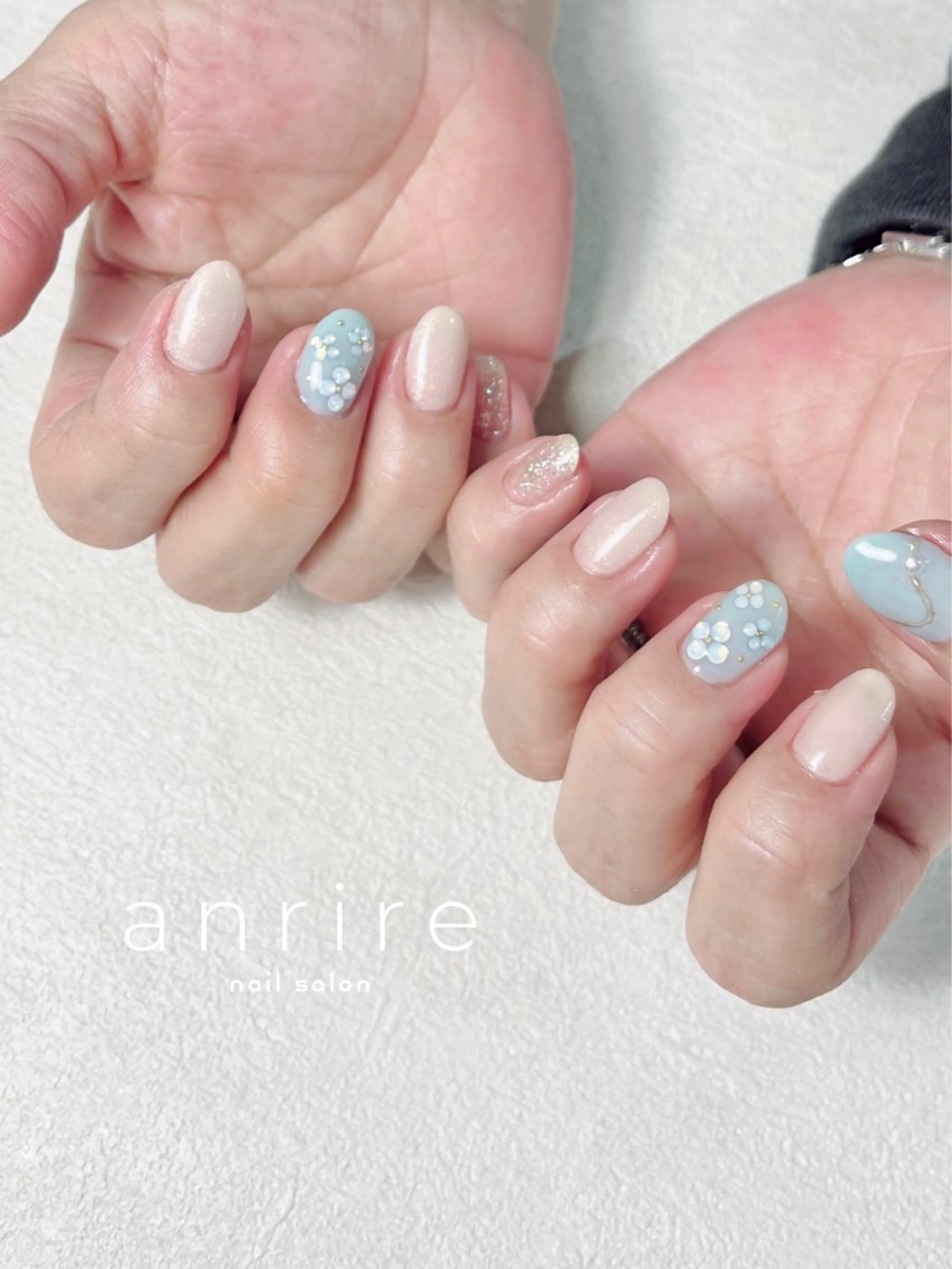 ネイル ブルー フラワーネイル フットネイル ジェルネイル キラキラネイル ハンドネイル nail salon anrire〜アンリール〜所属・nailsalon anrireのネイルデザイン