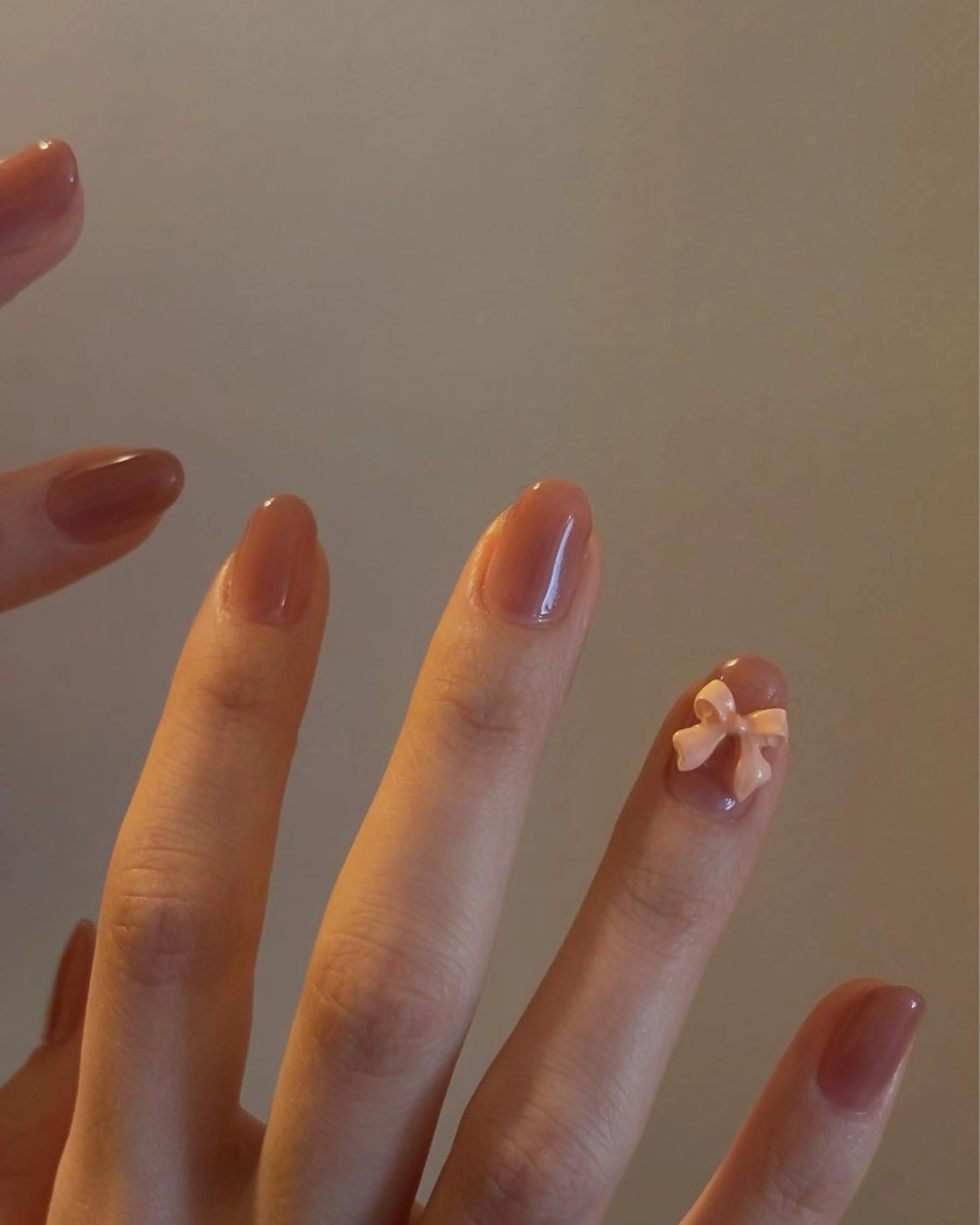 ネイル ピンク リボン Elio所属・Elio 国泰寺のネイルデザイン