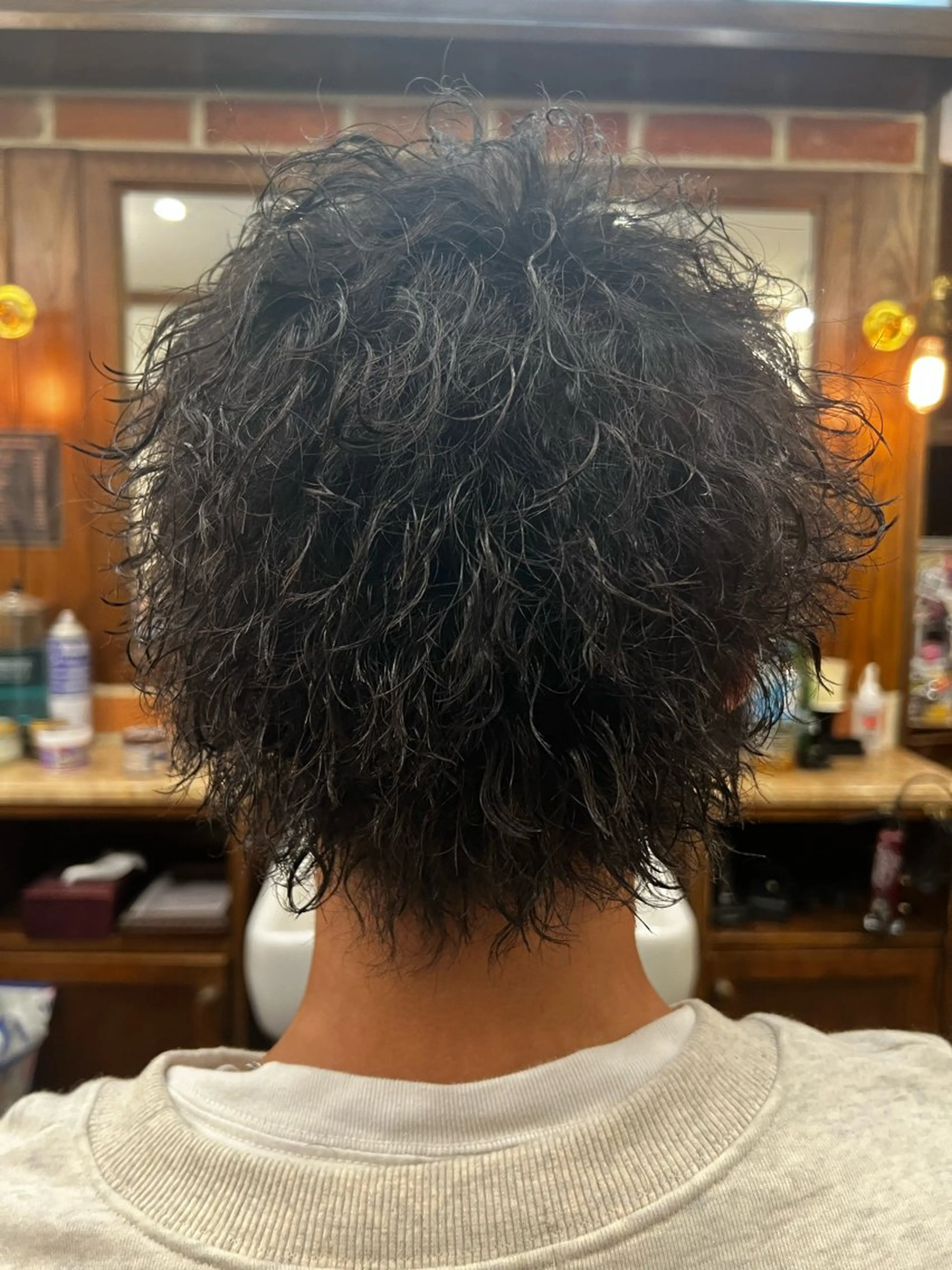 ミディアム パーマ 大久保 竣太のヘアスタイル