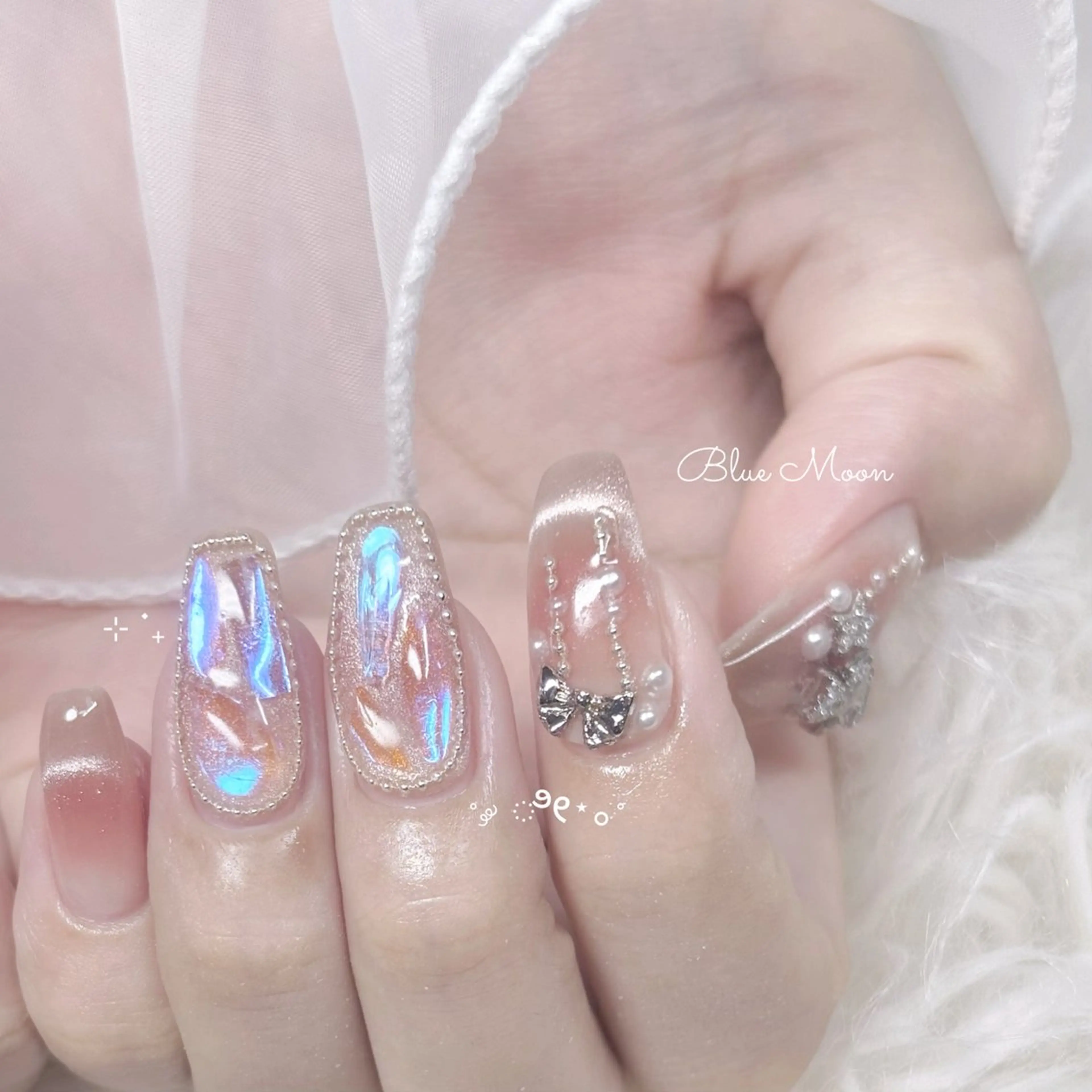 ネイル ストーンネイル ハンドネイル フットネイル ハンドケア nail salon Blue Moonのネイルデザイン