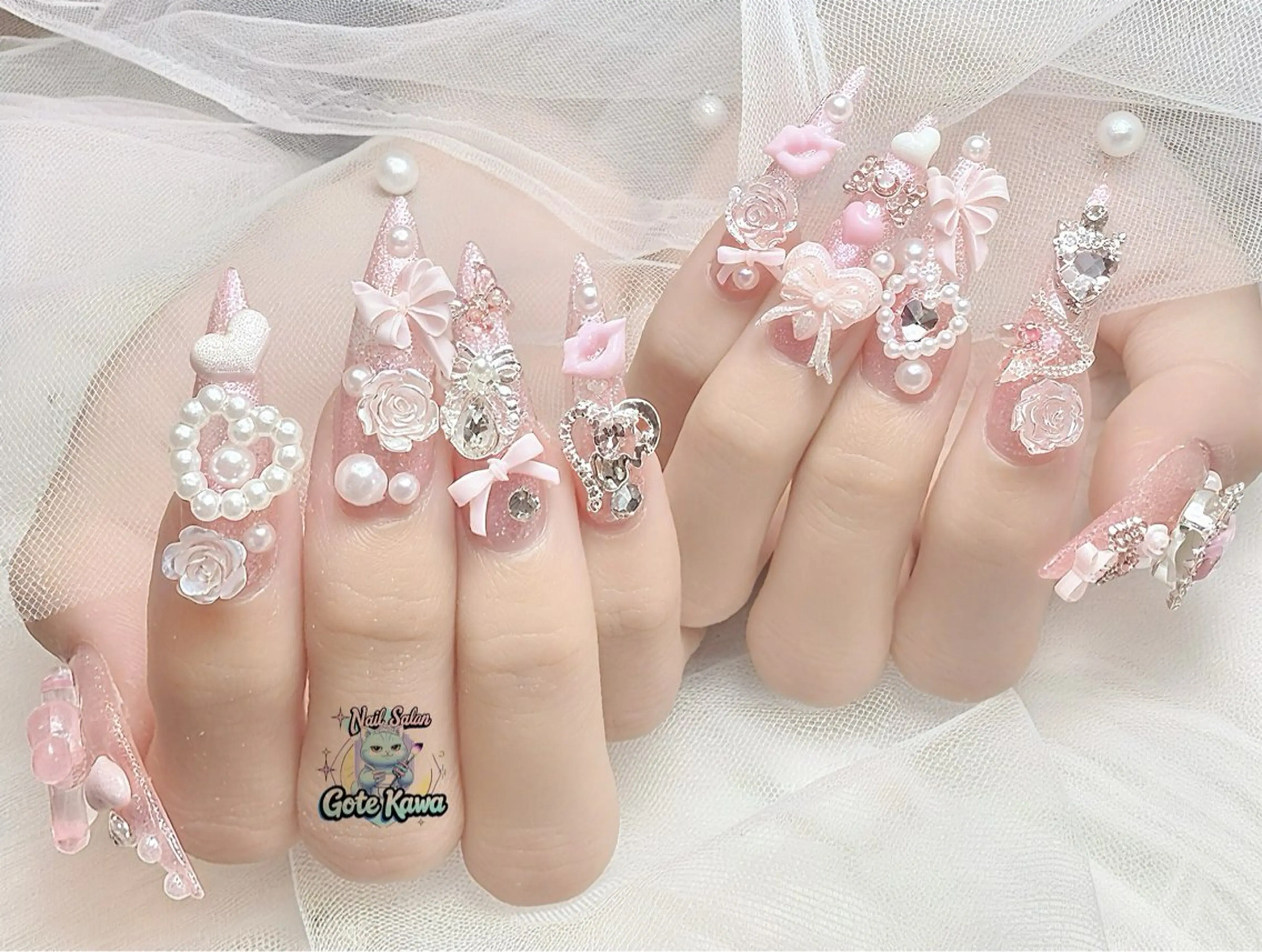 ネイル ハート ピンク リボン ハンドネイル ハンドケア GOTE KAWA Nail Salon(ゴテかわ)所属・Gote Kawa nail salonのネイルデザイン