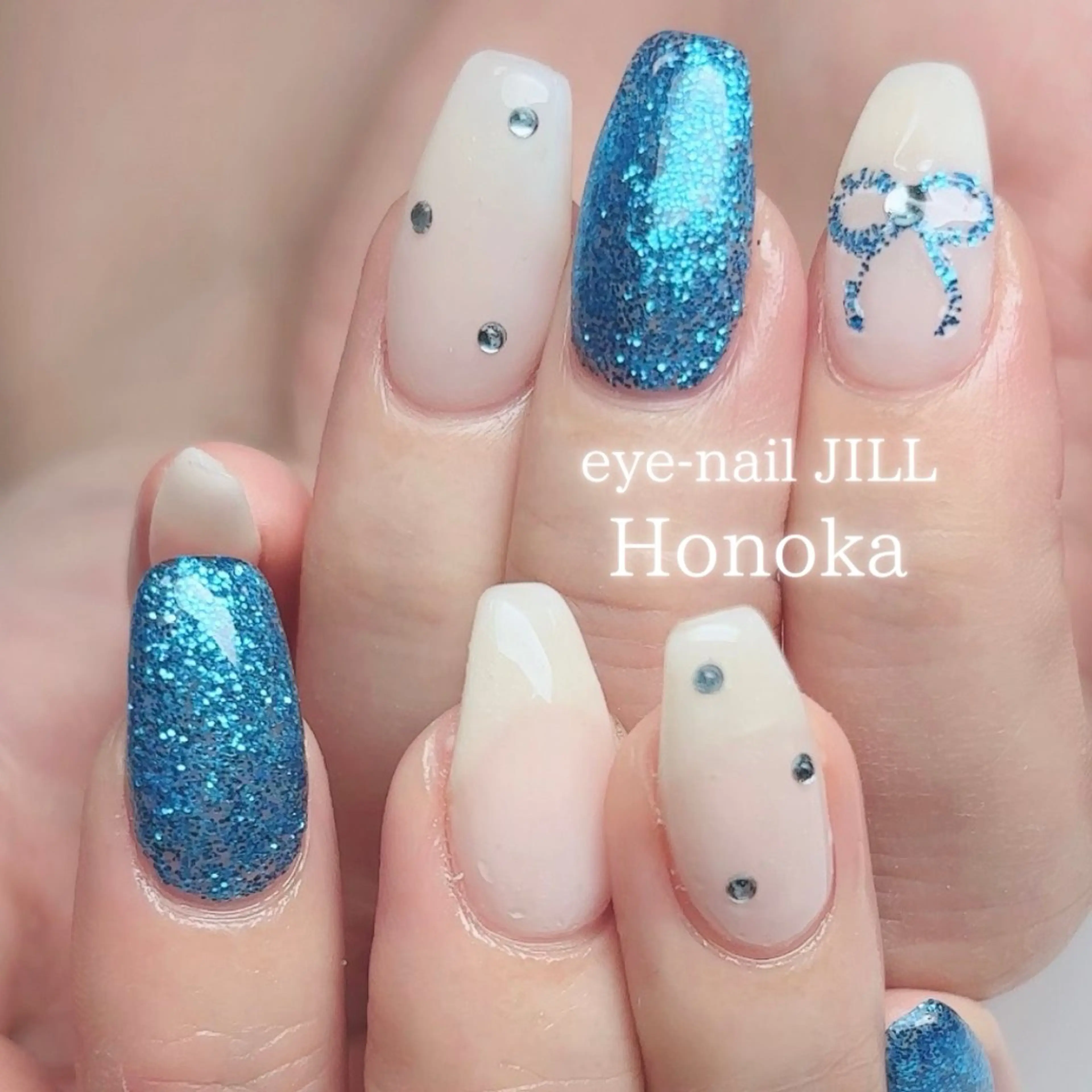 ネイル ブルー 水色 リボン ハンドネイル JILL Honokaのネイルデザイン