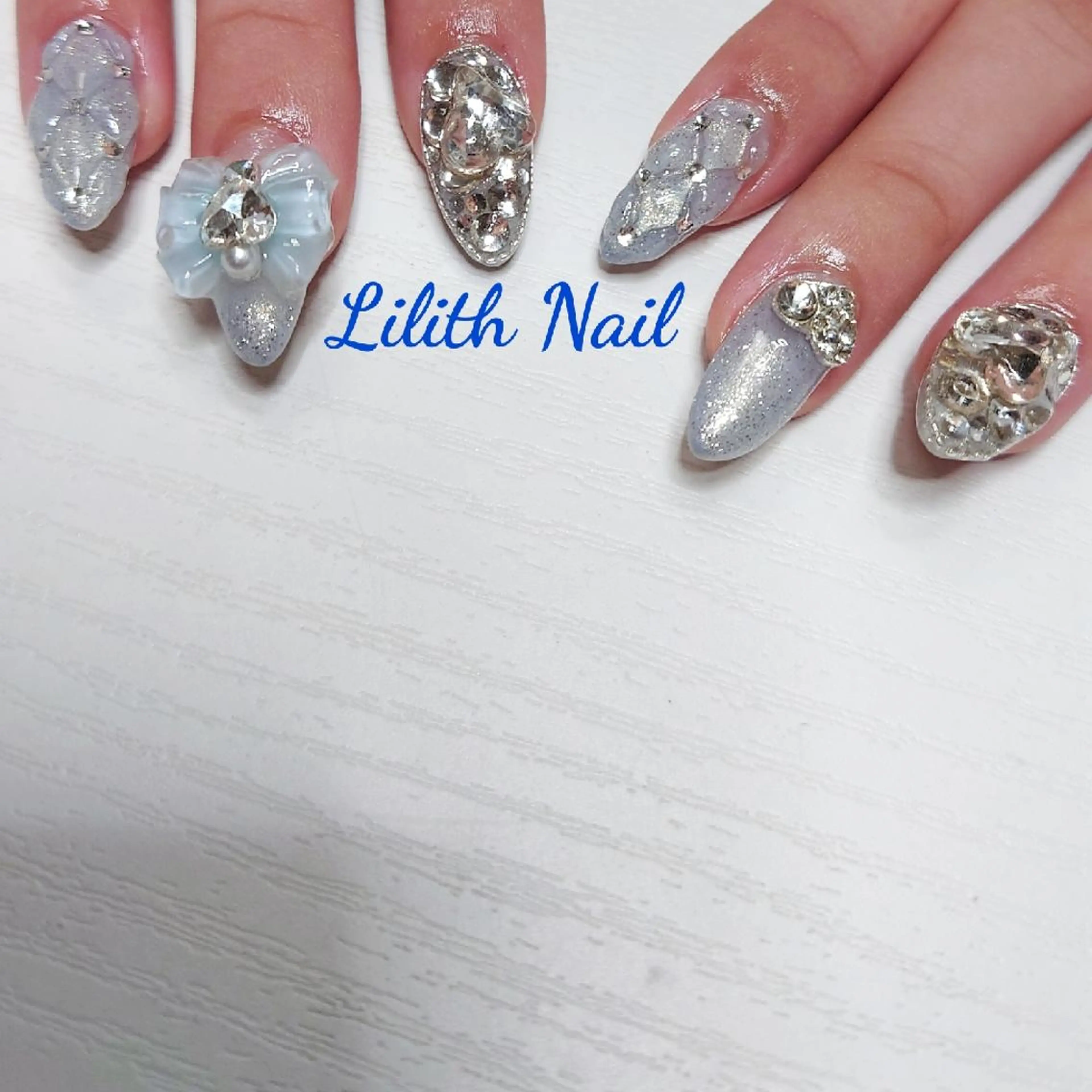 ネイル ブルー ジェルネイル ハート 持ち込み リボン Lilith Nailのネイルデザイン