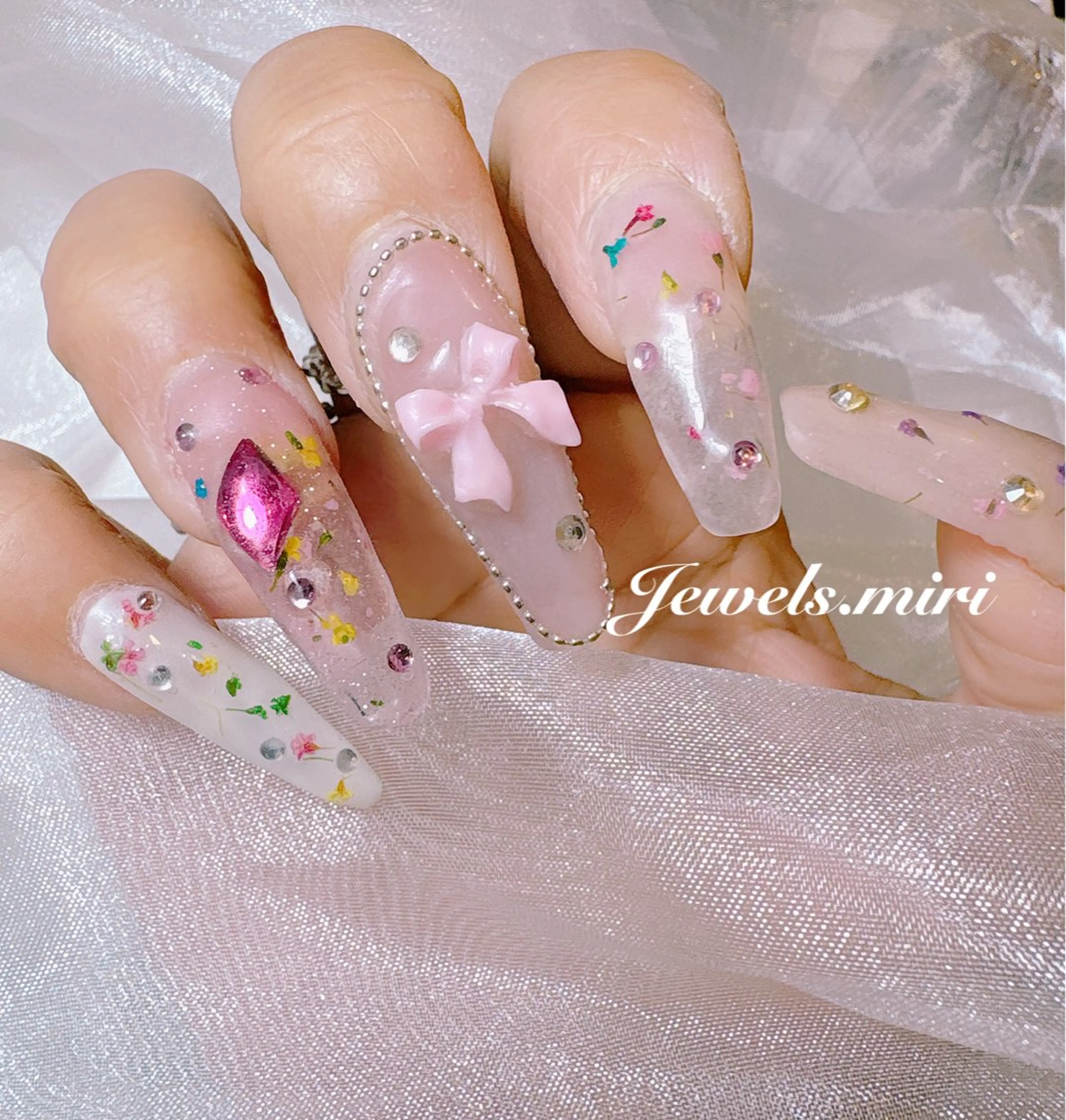 ネイル フラワーネイル ロングネイル ピンク リボン 春ネイル Jewels nail lily 白楽所属・ネイルサロン Jewels Mのネイルデザイン