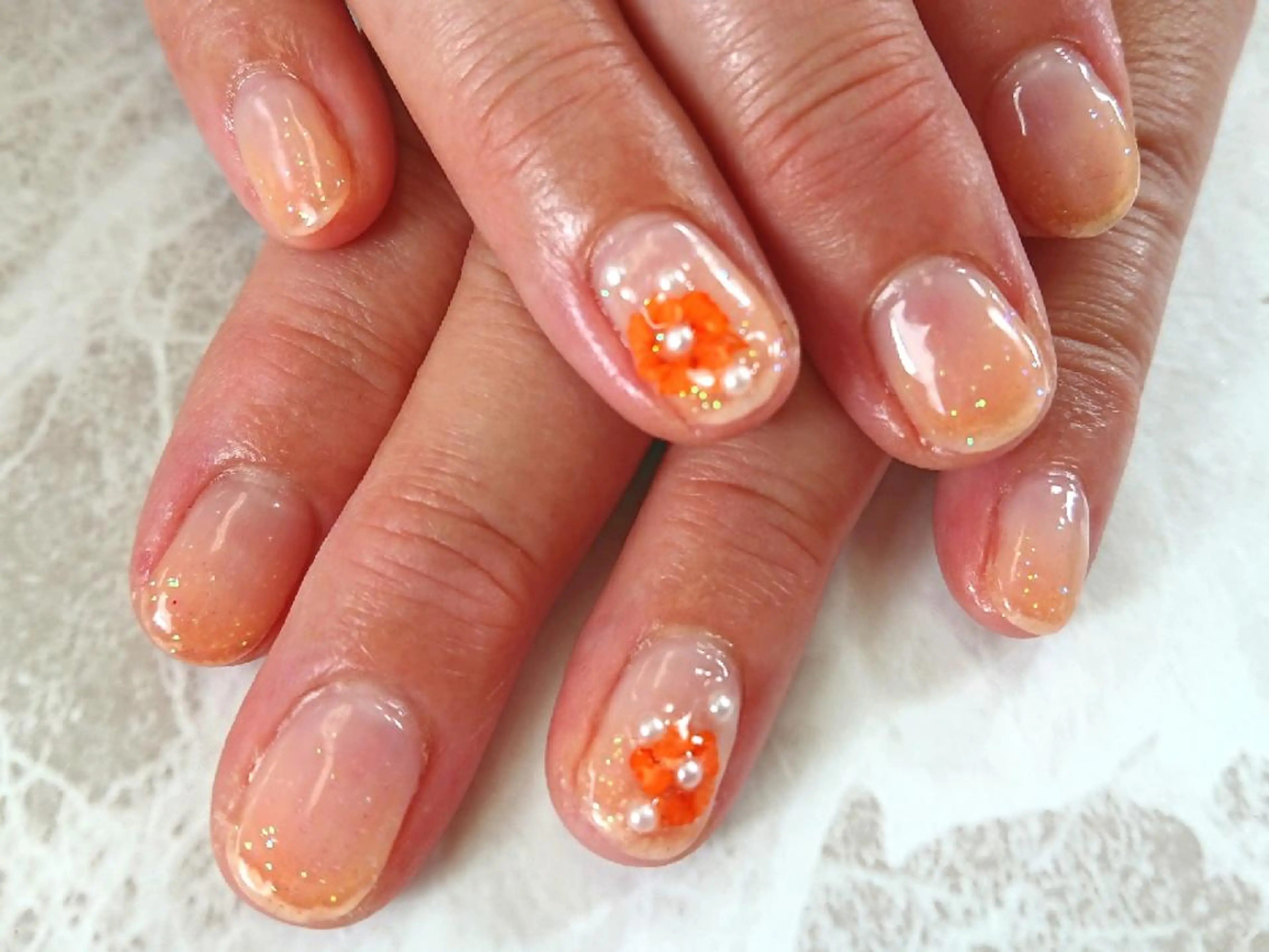 ネイル グラデーション ラメ(グリッター) ラメグラデーション オレンジ 林 珠里のネイルデザイン