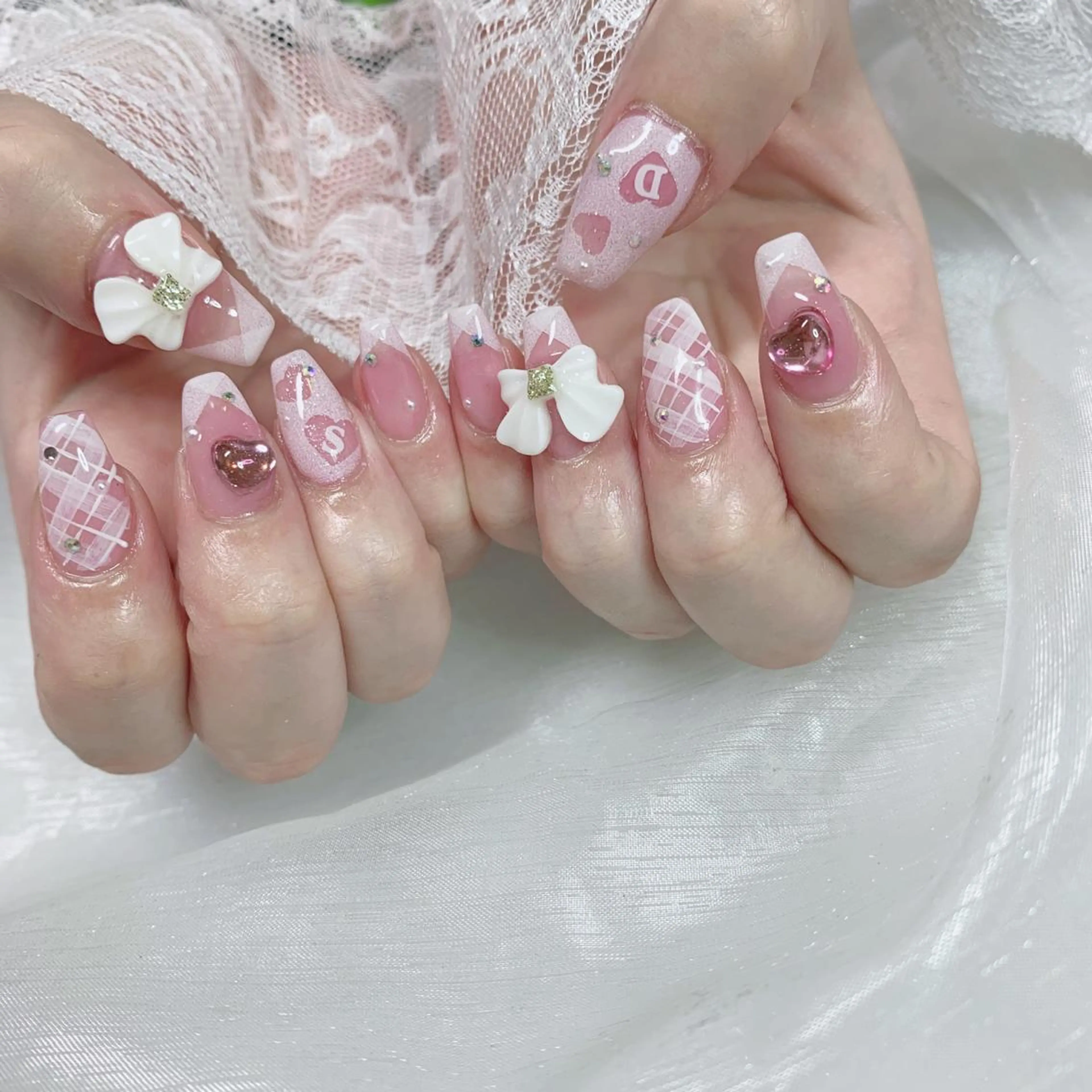 ネイル リボン ハンドネイル La neige* yuki 🥯🍑のネイルデザイン