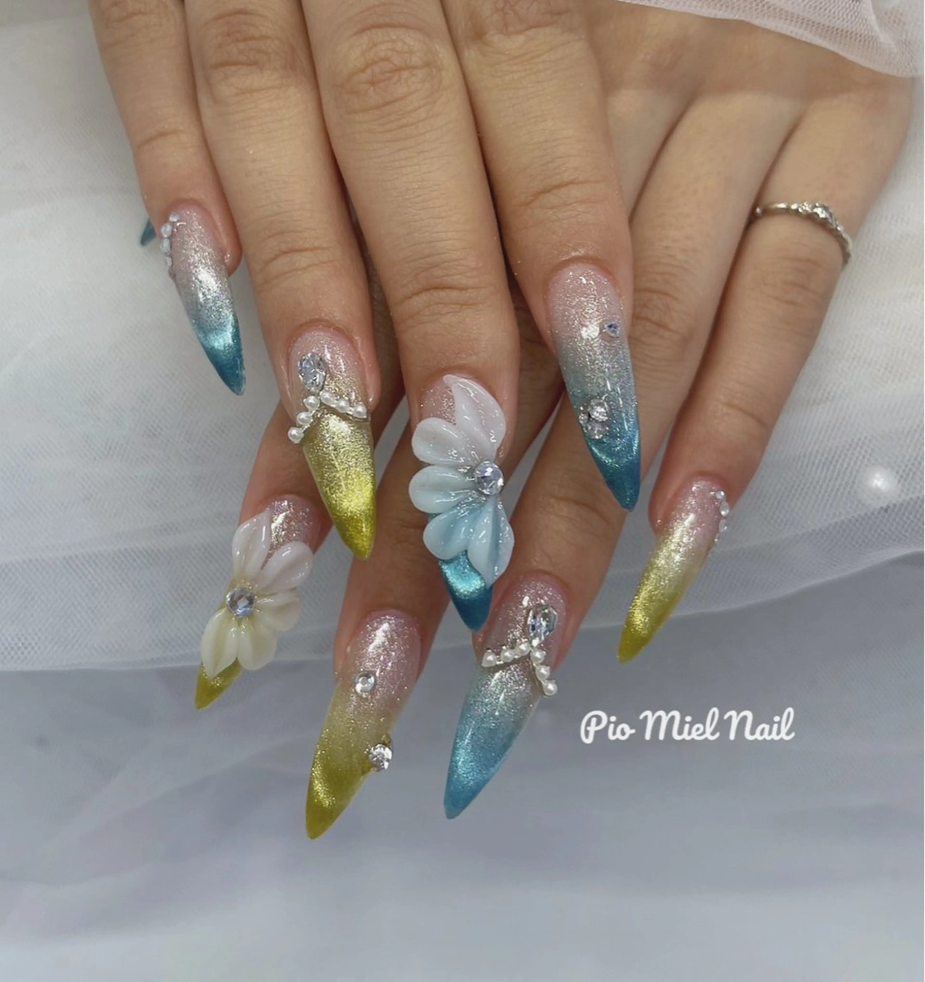 ロング ハンドネイル Pio Mielのネイルデザイン