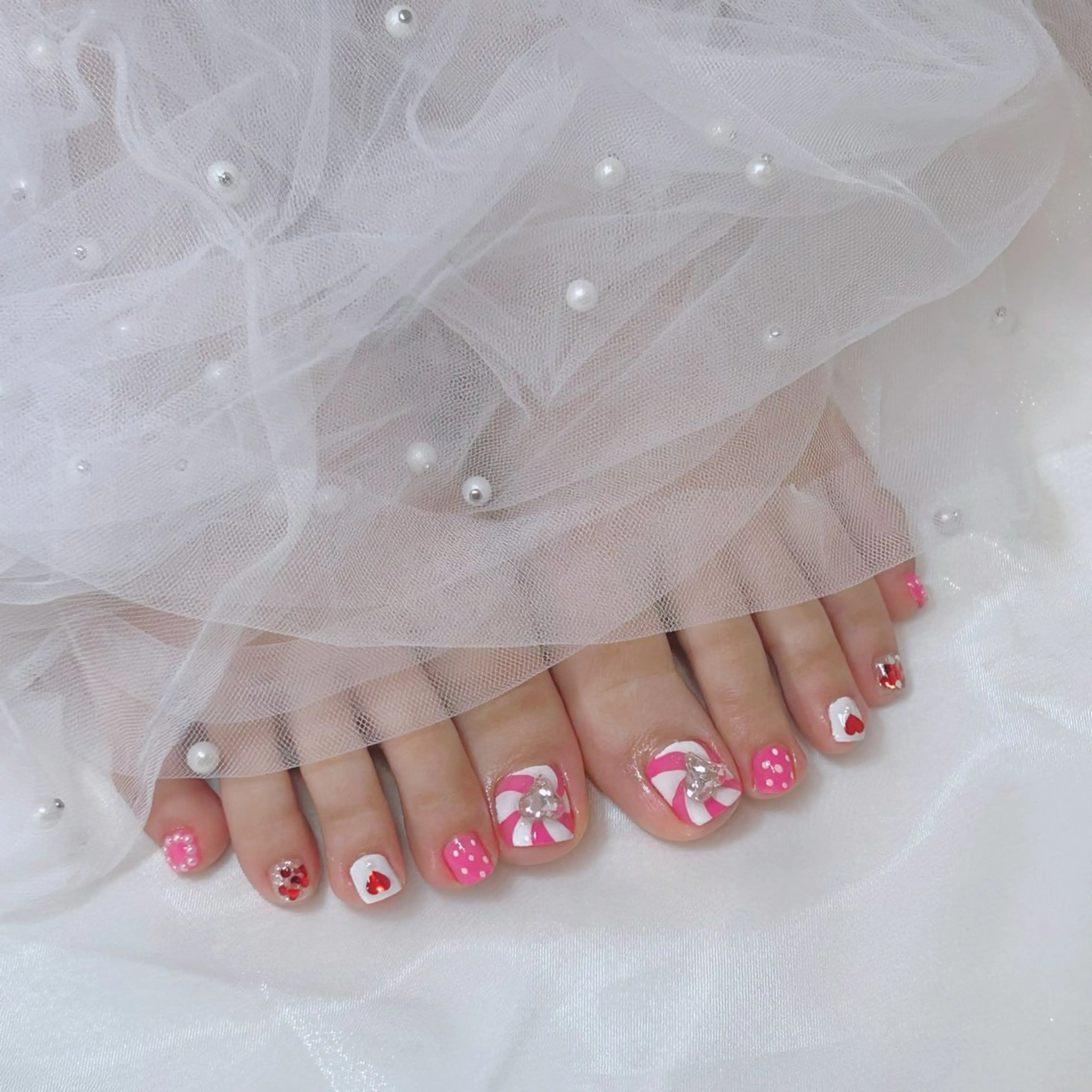 ネイル フットネイル ピンク nico +所属・nico + 鷲野のネイルデザイン