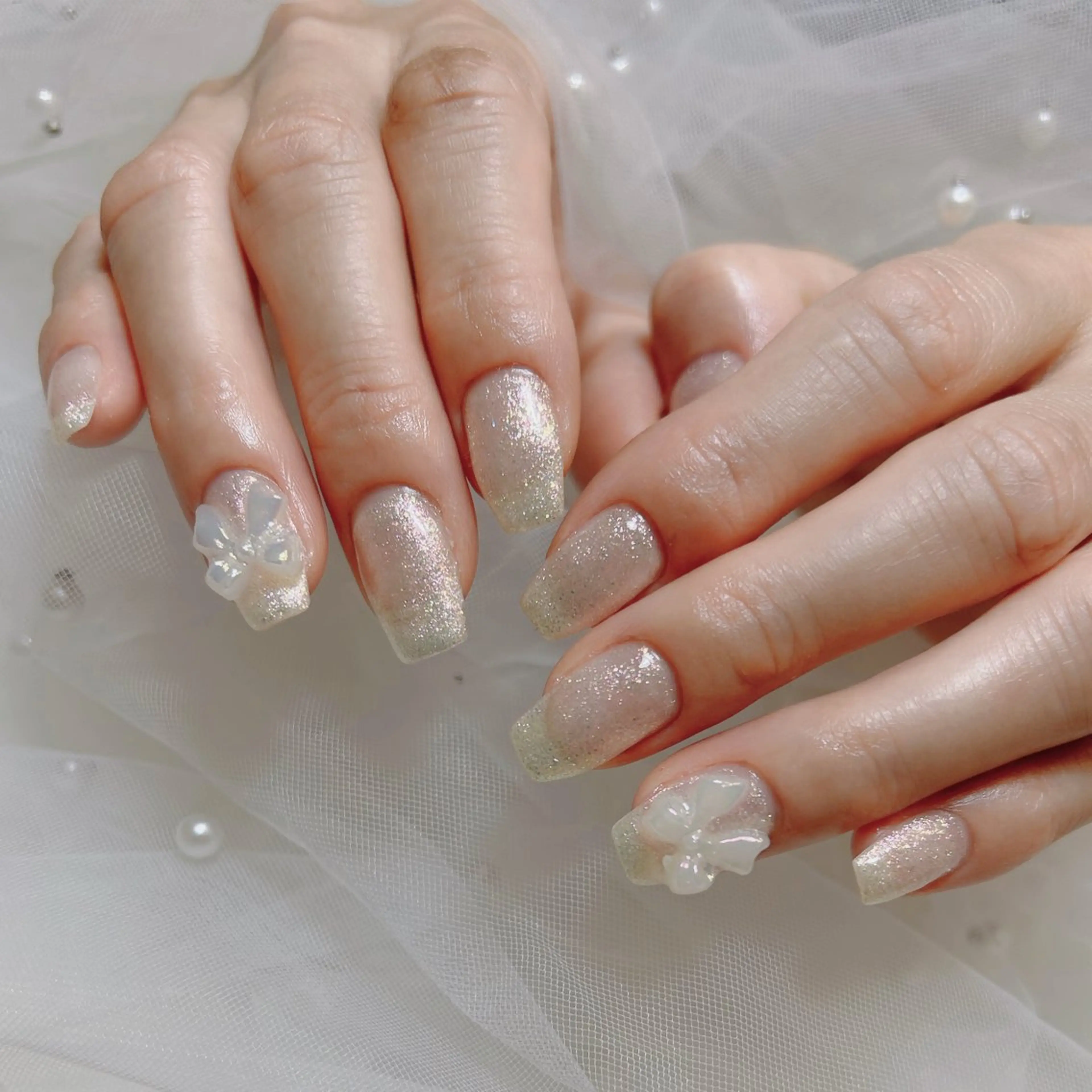 ネイル ラメ(グリッター) ワンカラーネイル リボン ハンドネイル EmaNail天満橋店所属・EmaNail Risaのネイルデザイン