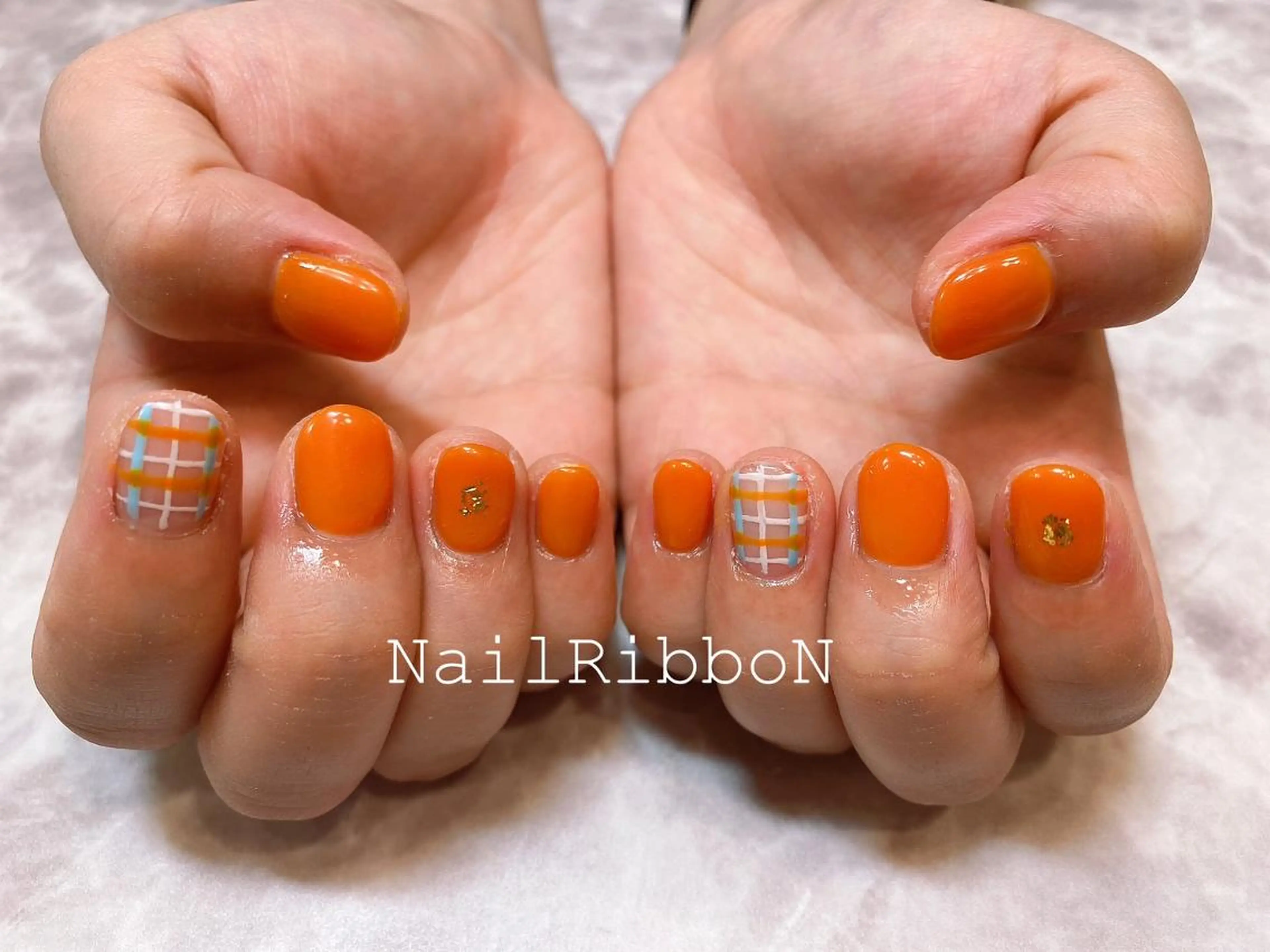 ネイル ネイルリボン 受付スタッフのネイルデザイン