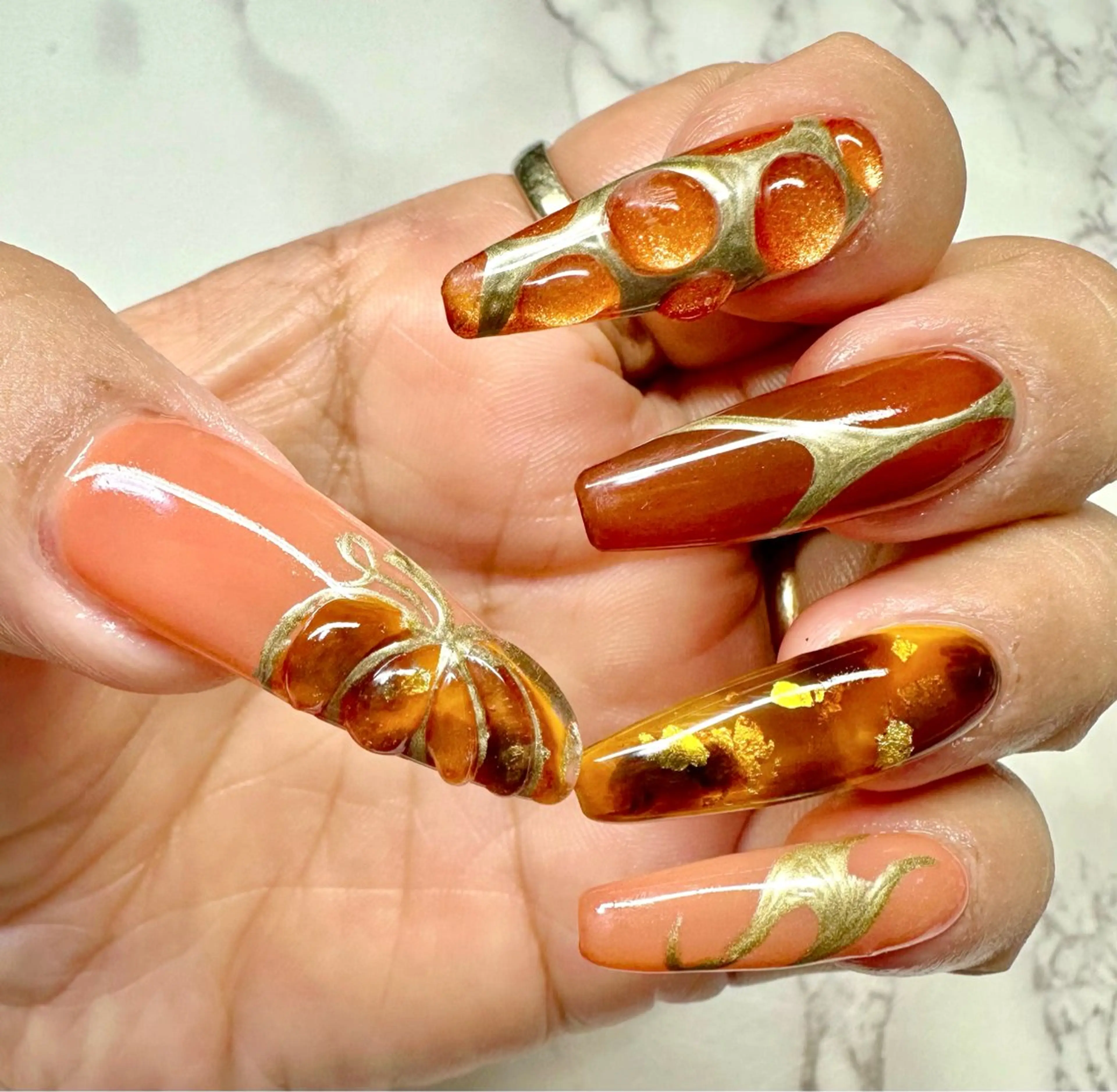 ネイル べっ甲ネイル ハロウィン キラキラネイル マグネットネイル ミラーネイル M.N_ nailのネイルデザイン