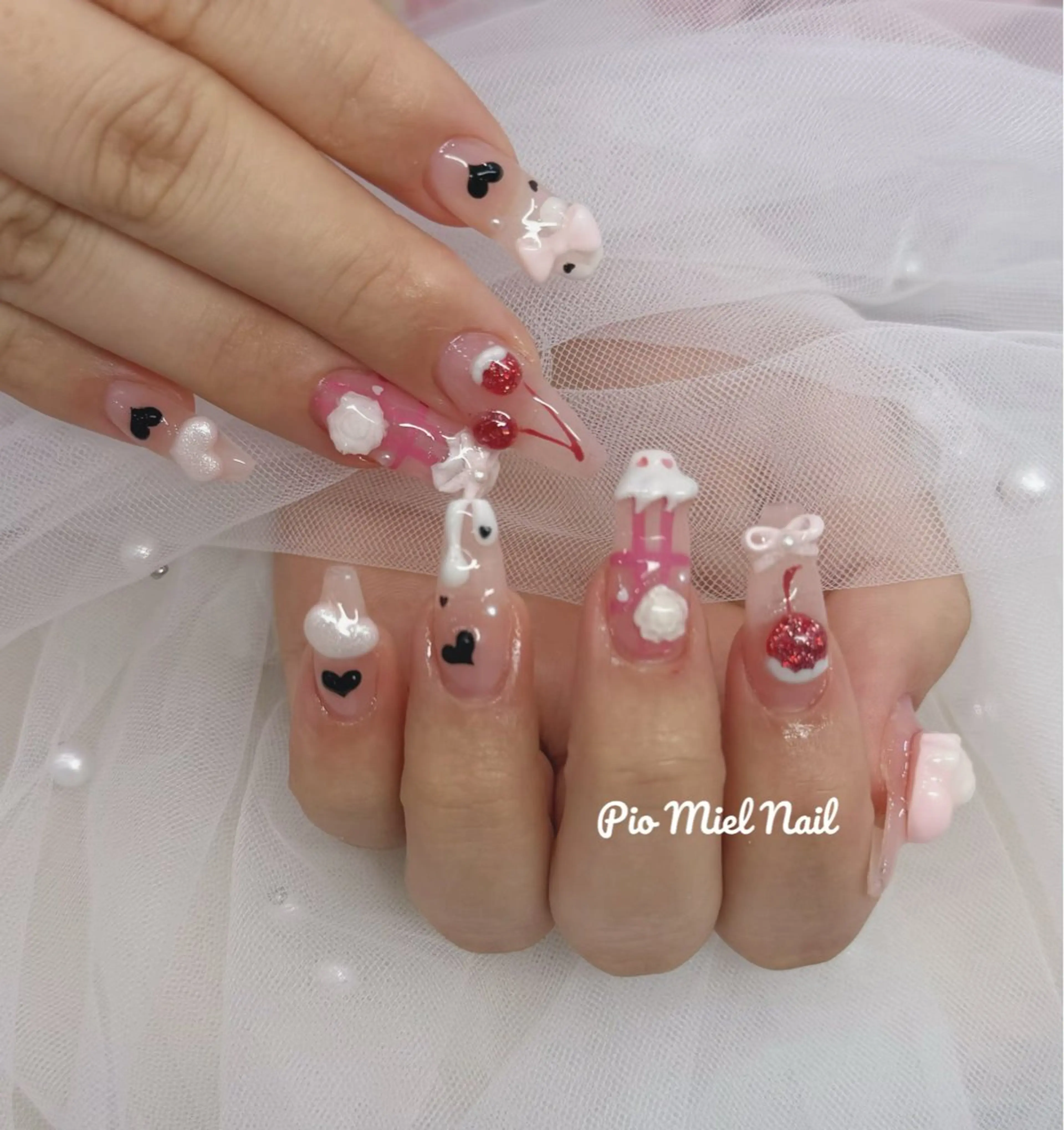 ネイル ガーリー ハート ロングネイル ピンク リボン ハンドネイル momo 長さだしのネイルデザイン