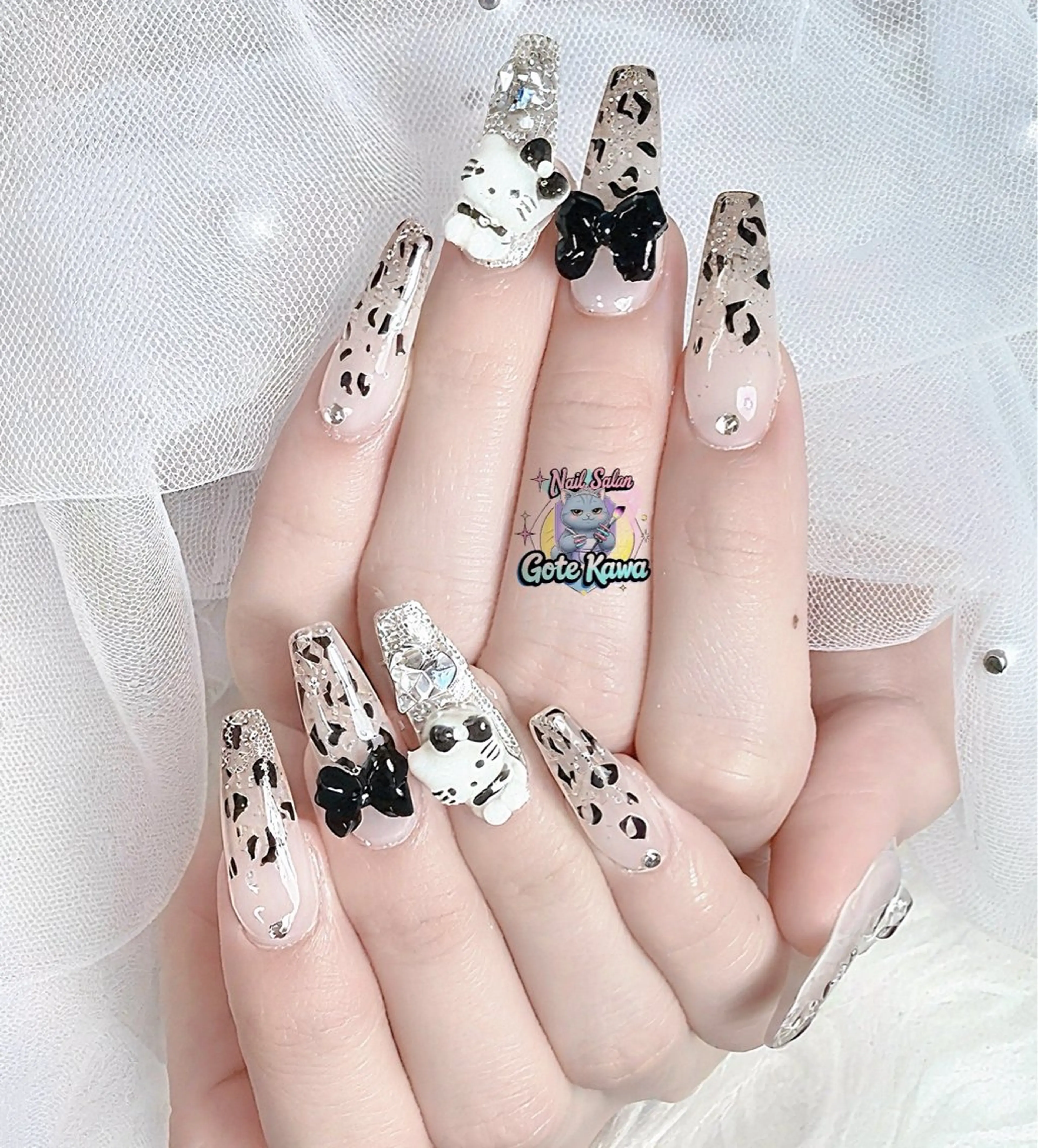 ネイル アニマル柄 リボン ハンドネイル ハンドケア GOTE KAWA Nail Salon(ゴテかわ)所属・Gote Kawa nail salonのネイルデザイン