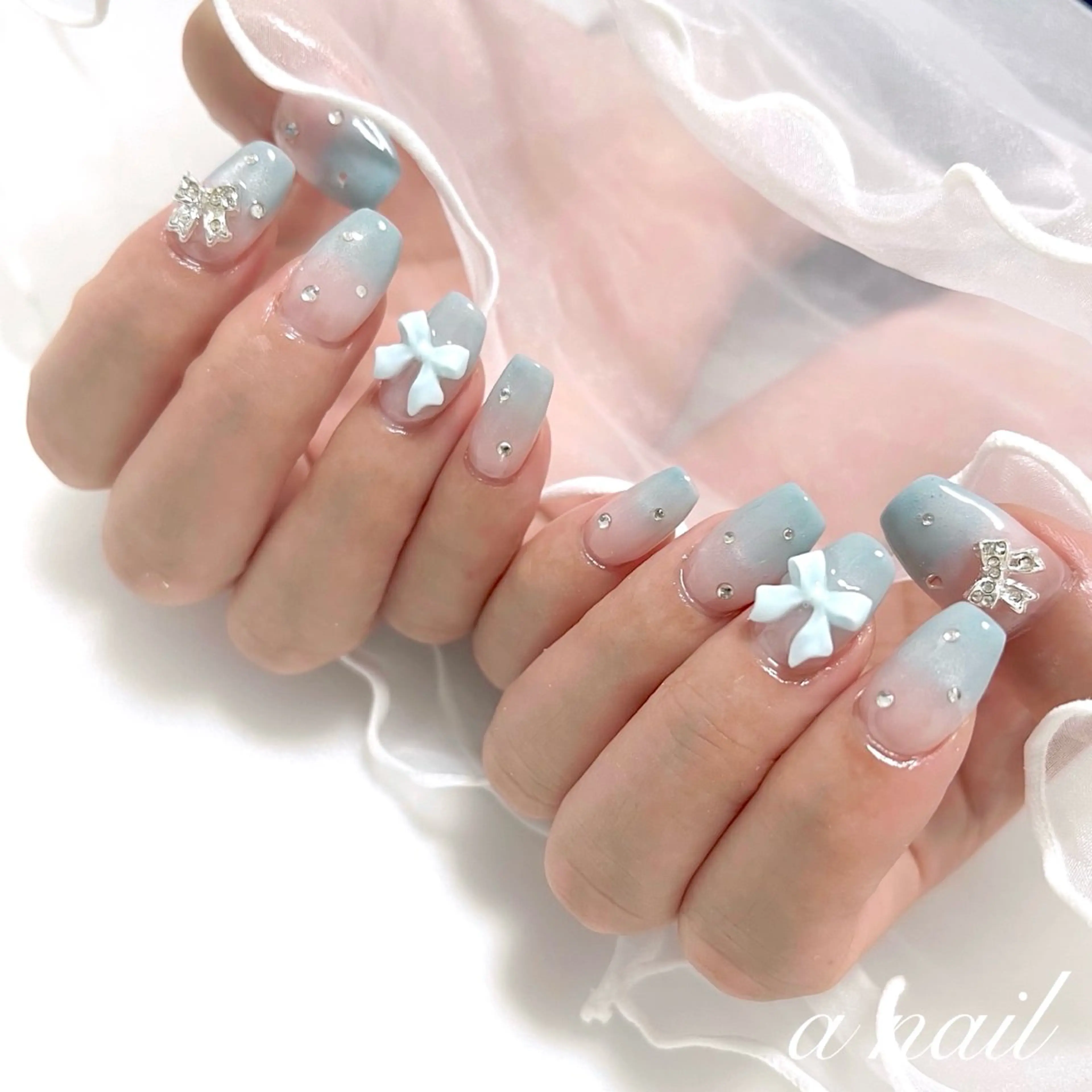 ネイル グラデーション 持ち込み パステルネイル リボン 春ネイル Salon_ a.nailのネイルデザイン