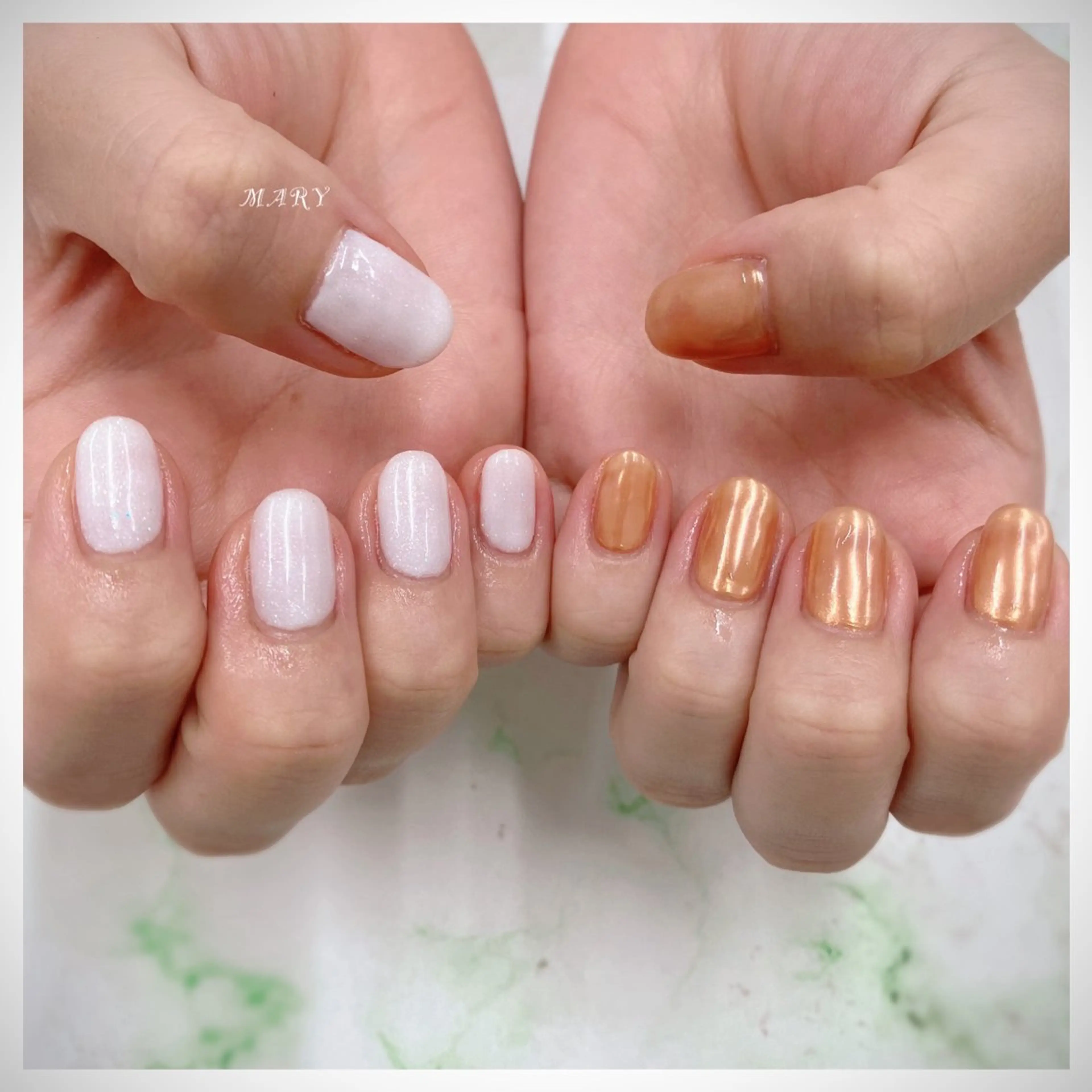 ネイル ミラーネイル ニュアンスネイル ワンカラーネイル オレンジ ホワイト ハンドネイル Mary nail所属・Mary nail .narumiのネイルデザイン
