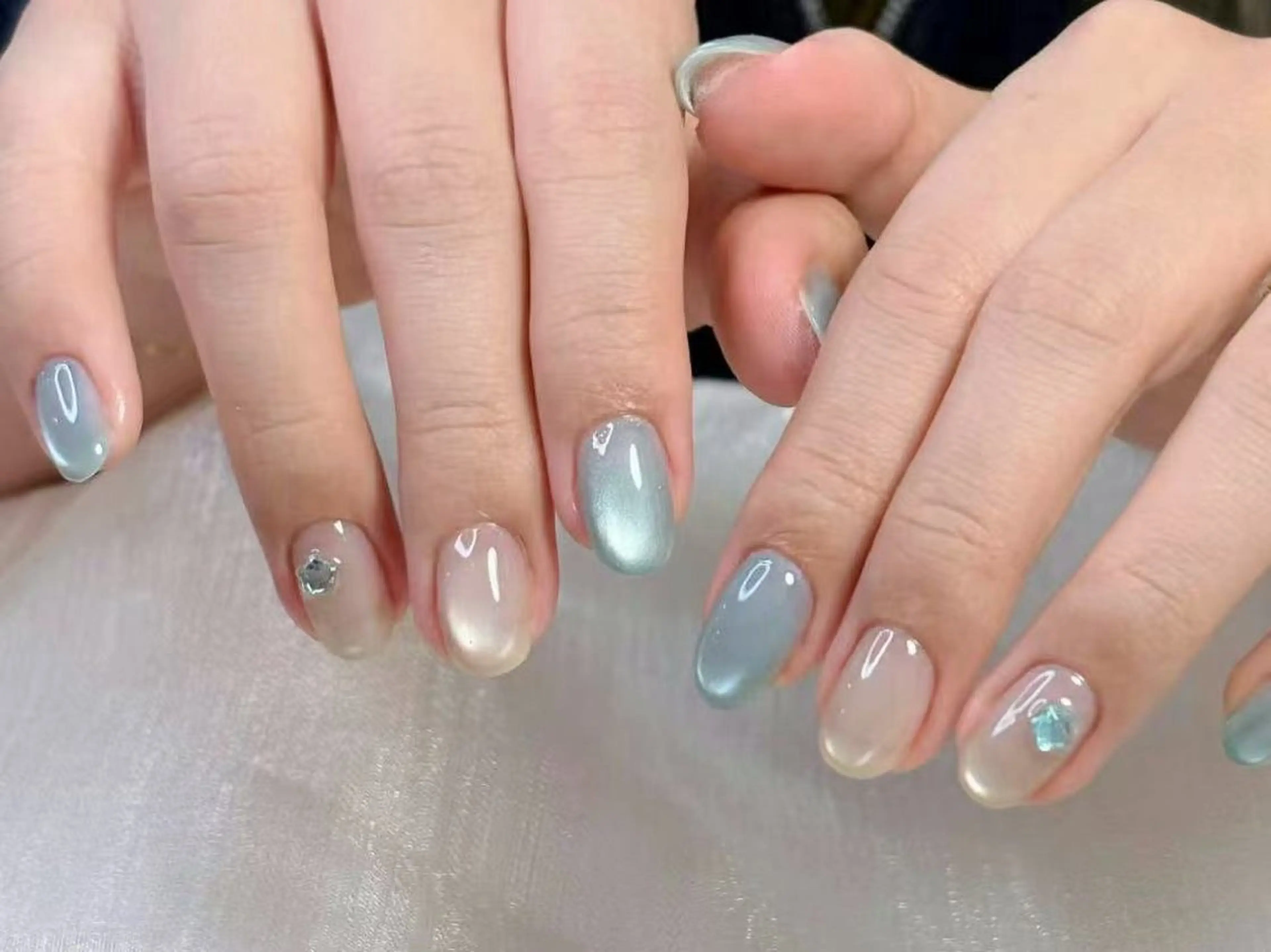 ネイル オーロラネイル ブルー グラデーション マグネットネイル ニュアンスネイル ハンドネイル ハンドケア DarkHoney 池袋店のネイルデザイン