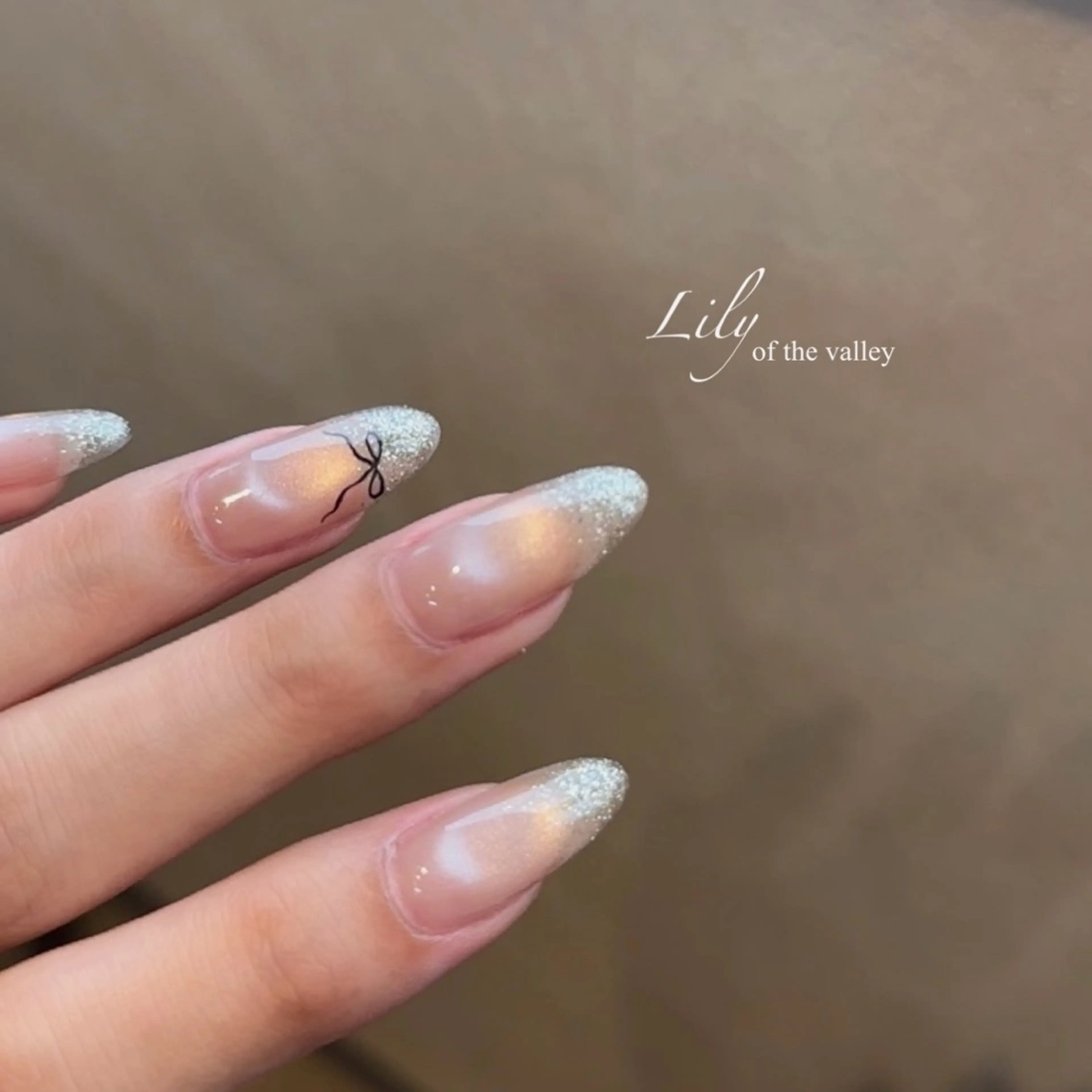 ネイル リボン ハンドネイル Lily nails所属・chika🫶🏻 /中目黒のネイルデザイン