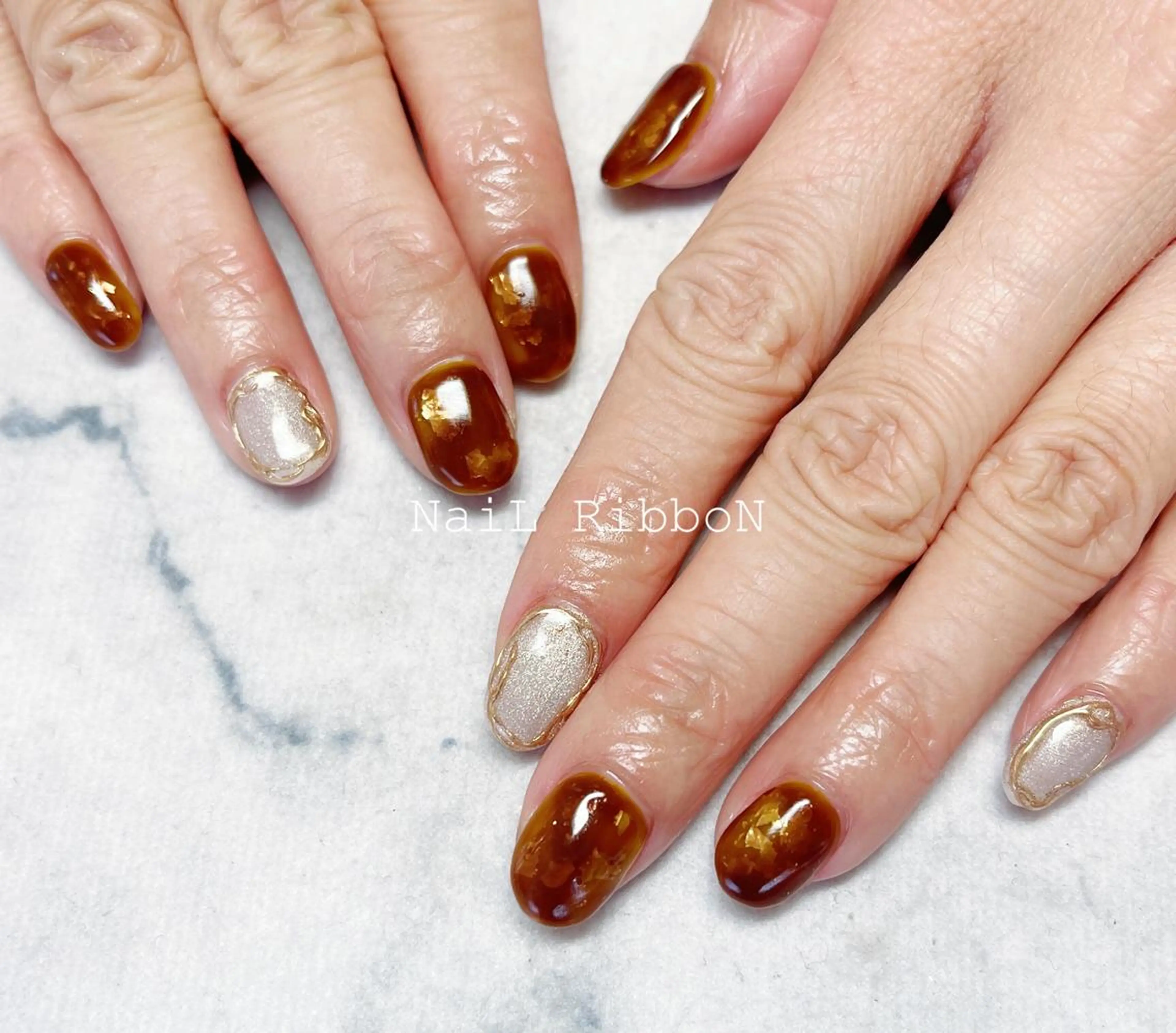 ネイル ネイルリボン 受付スタッフのネイルデザイン