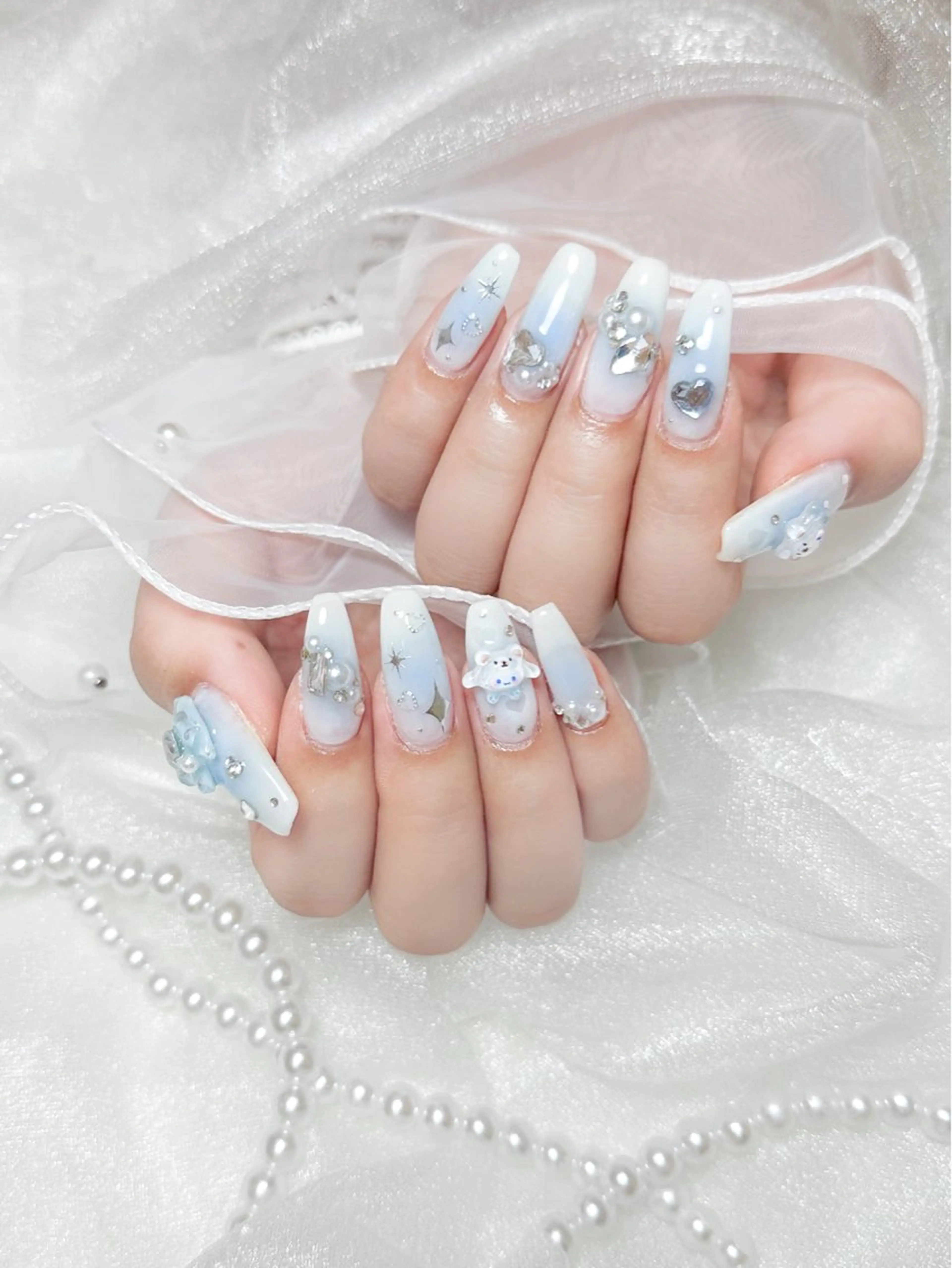ネイル リボン nano nail☁ 丸の内駅💫のネイルデザイン